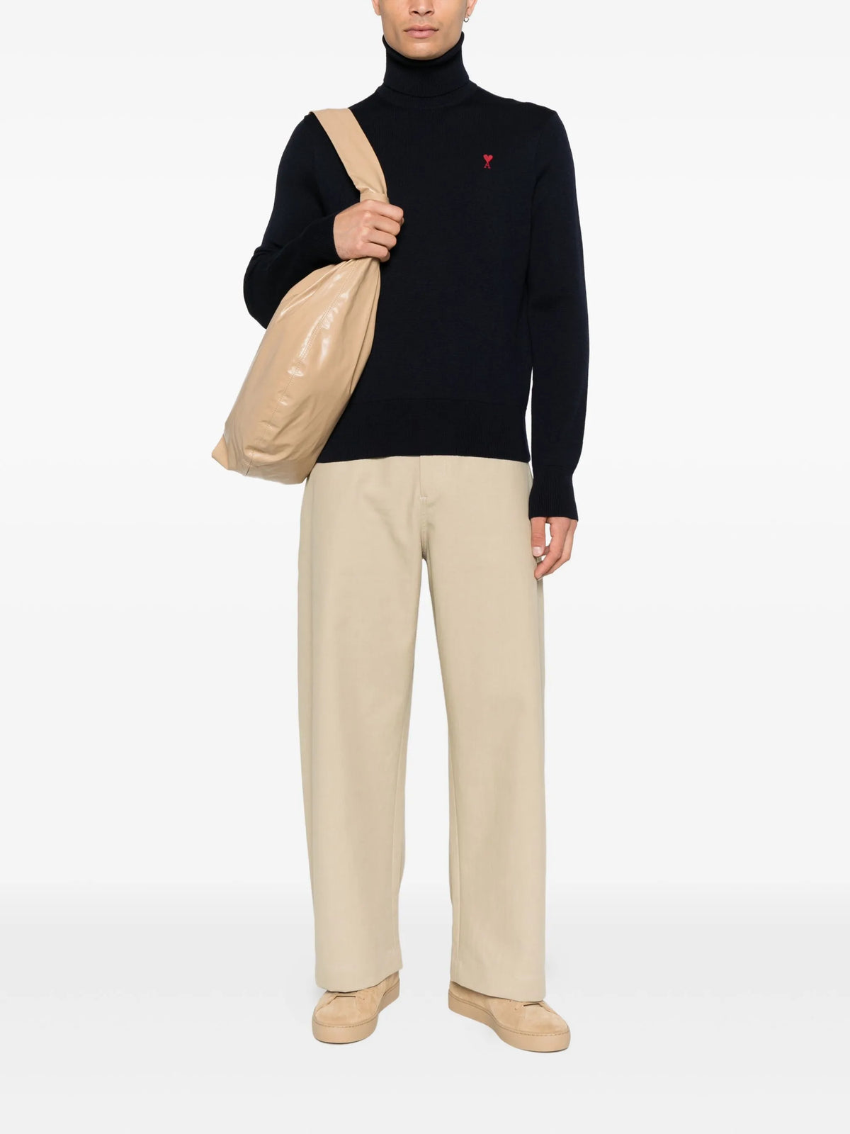 Image of Navy Wool Turtleneck Sweater by Ami PARIS for Men - Season Autumn-Winter 2026 - Model View 1