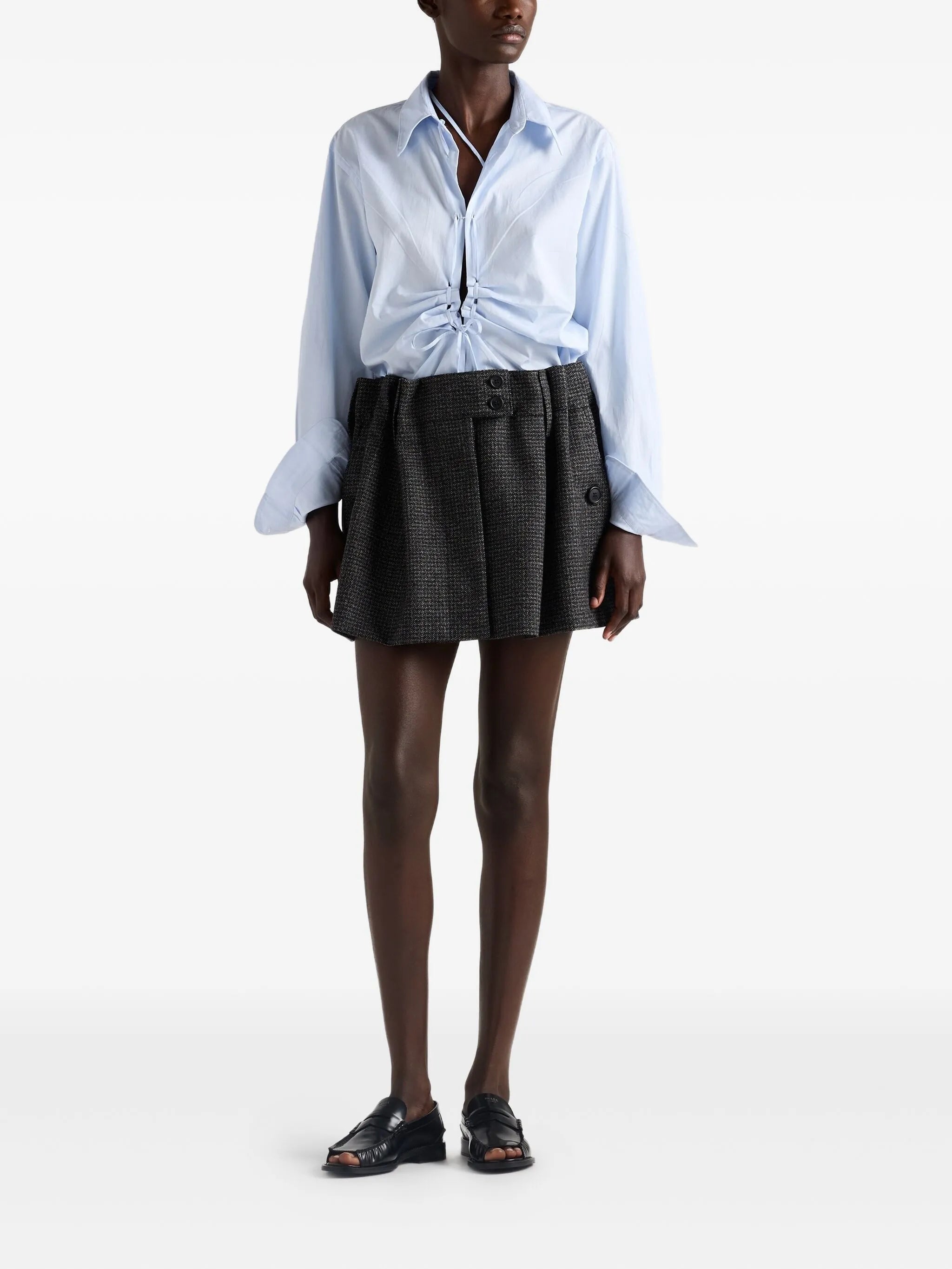 Image of Prada Blue Knot Shirt by Prada for Women - Season Autumn-Winter 2025 - Model view 1
