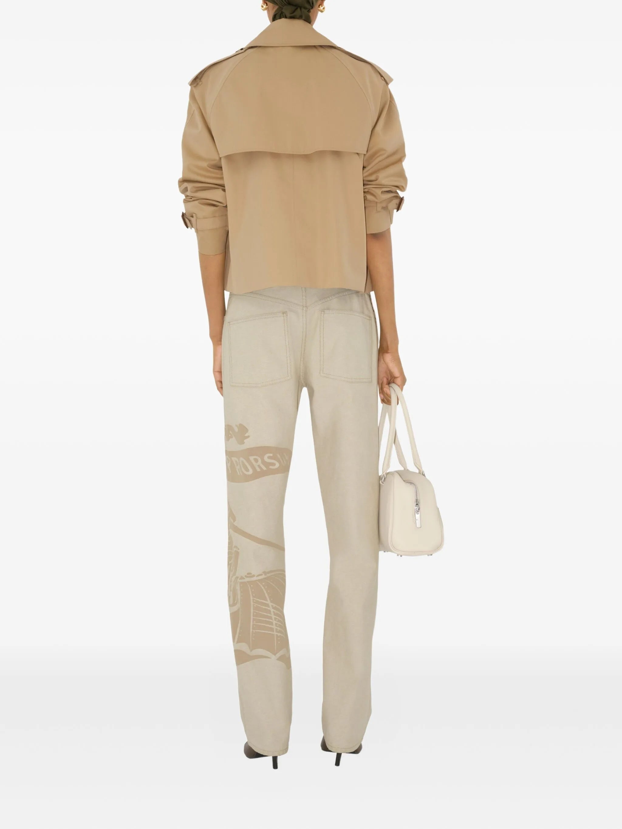 Image of Short Beige Trench Coat by Burberry for Women - Season Spring-Summer 2026 - Model view 3