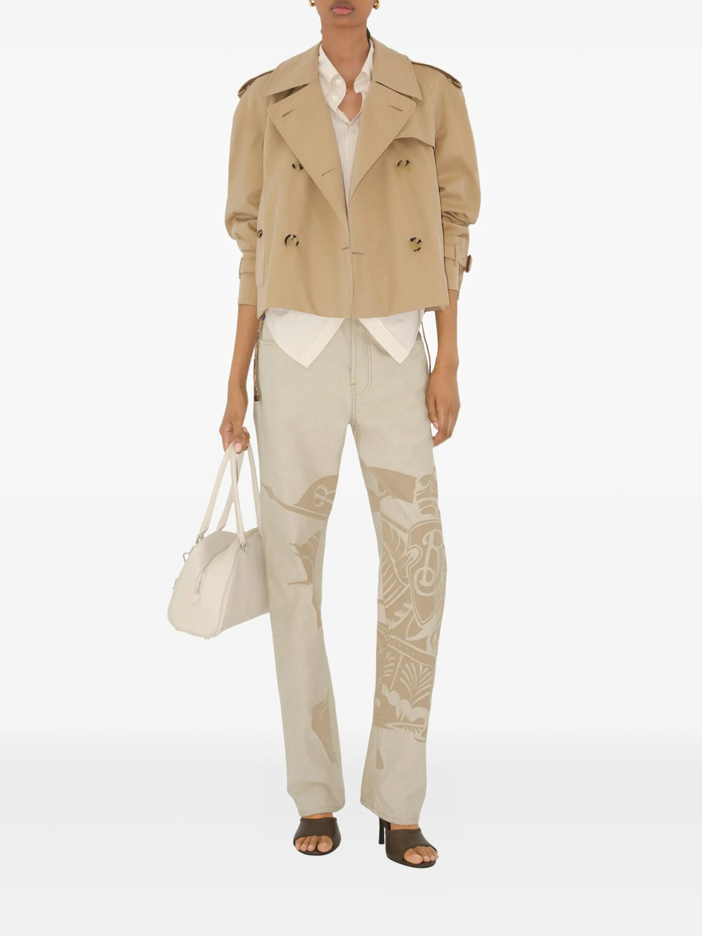 Image of Short Beige Trench Coat by Burberry for Women - Season Spring-Summer 2026 - Model view 1
