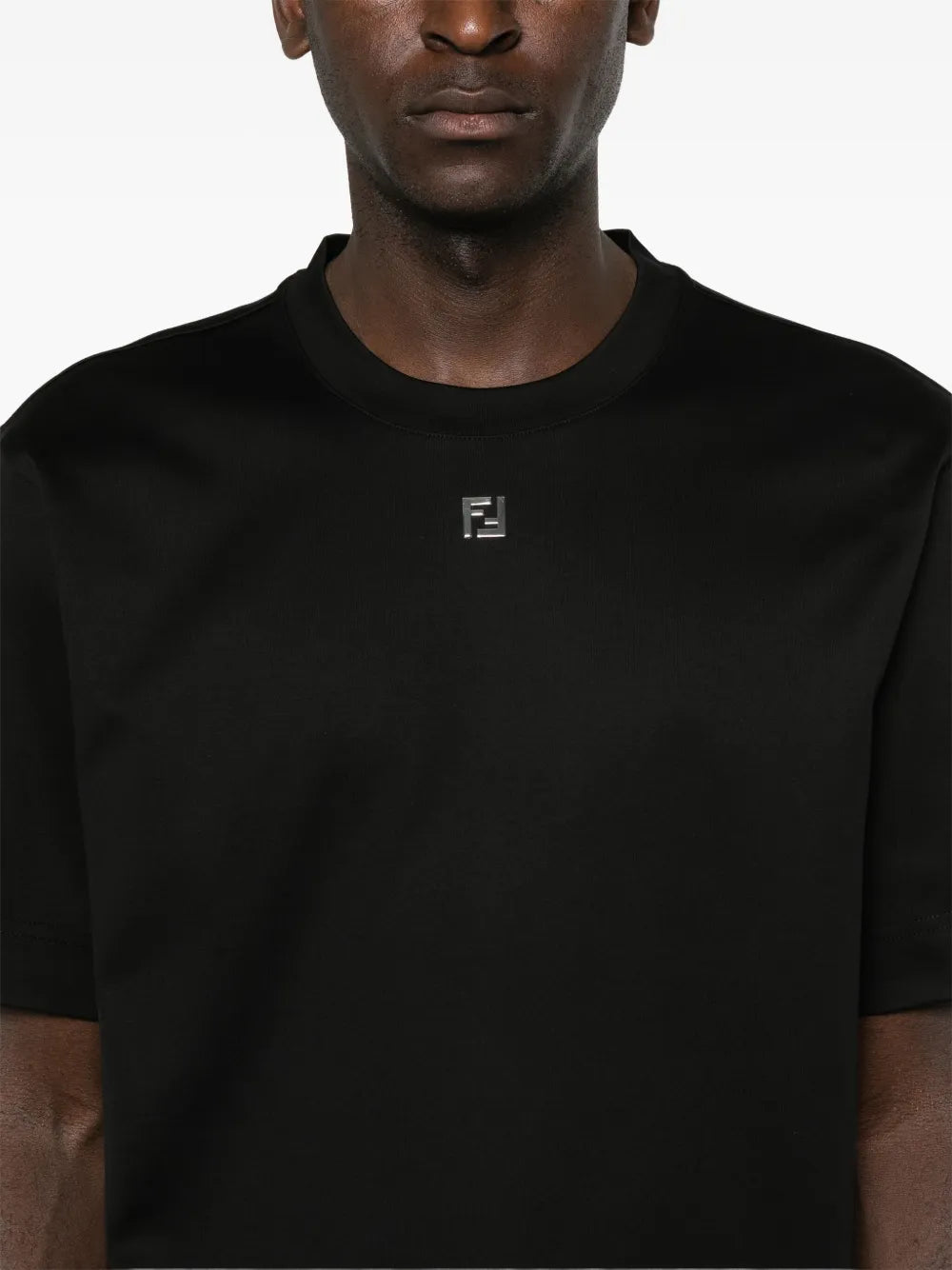 Image of Black Cotton T-Shirt with FF Metal Logo by Fendi for Men - Season Spring-Summer 2025 - Model view 4
