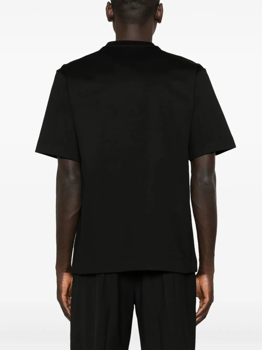 Image of Black Cotton T-Shirt with FF Metal Logo by Fendi for Men - Season Spring-Summer 2025 - Model view 3