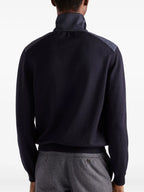 Immagine della giacca bicolore blu navy di Prada per uomo - Stagione Autunno-Inverno 2025 - Vista modello 2