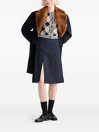 Image of Plaid Wool Cardigan by Prada for Women - Season Autumn-Winter 2025 - Model view 1