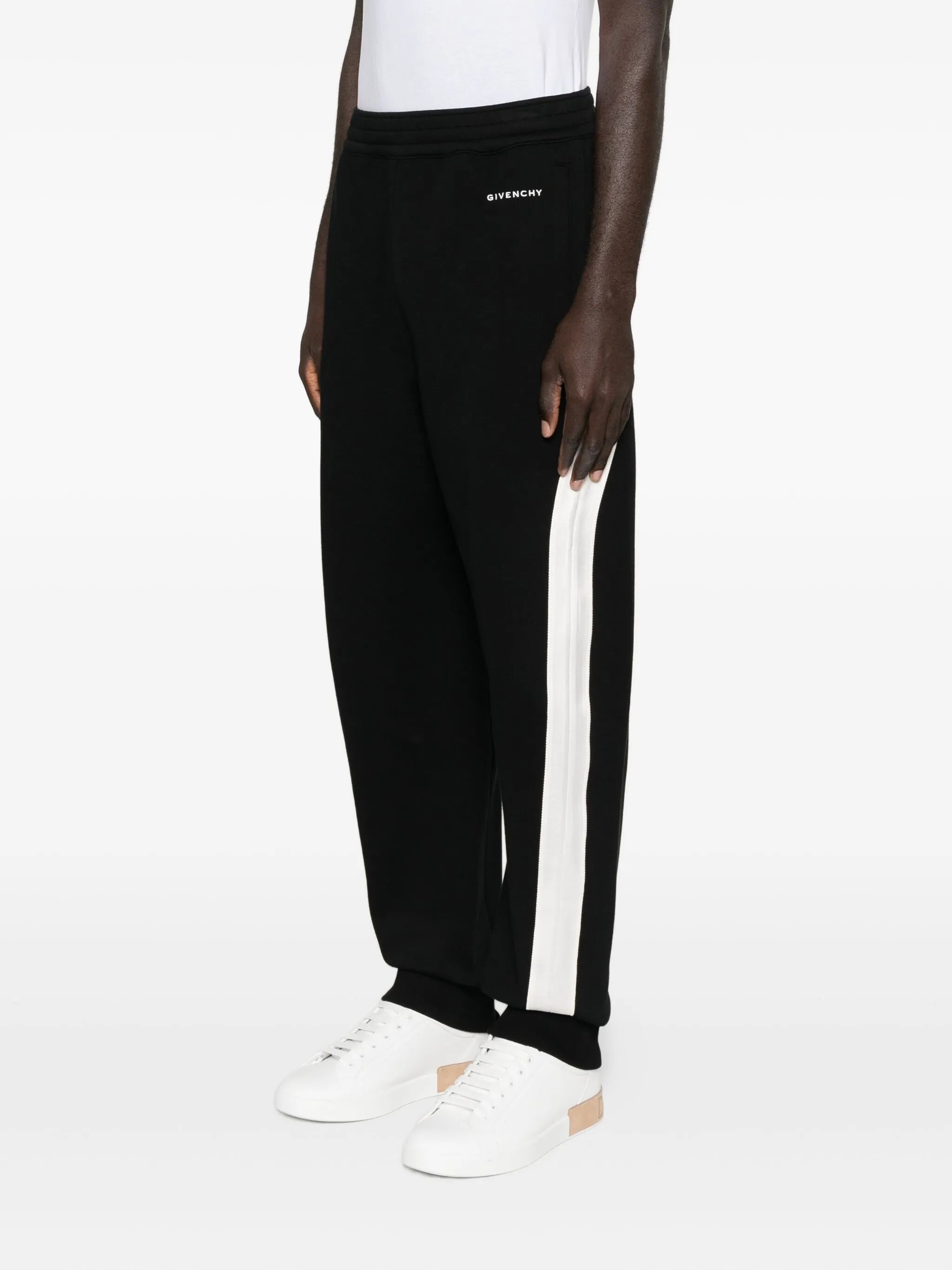 Image of Black Jogging Pants by Givenchy for Men - Season Autumn-Winter 2025 - Model View 2