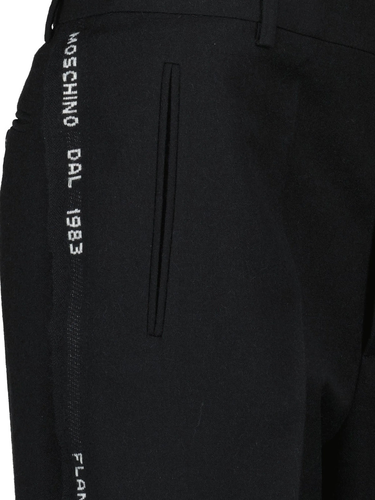 Image of Black Wool Trousers by Moschino for Women - Season Autumn-Winter 2025 - Model View 3