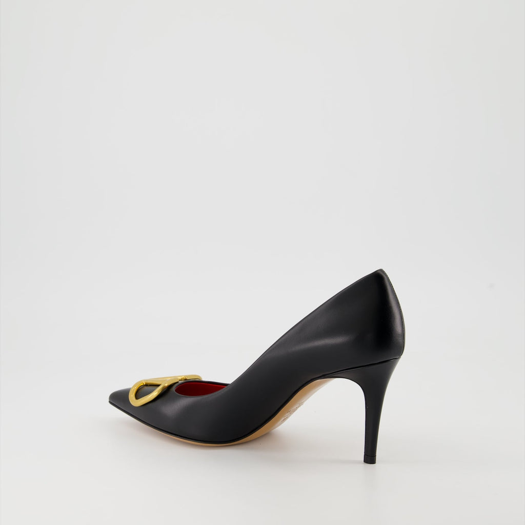   Valentino Garavani, black leather pumps, pointed-toe shoes, high-end fashion, luxury footwear