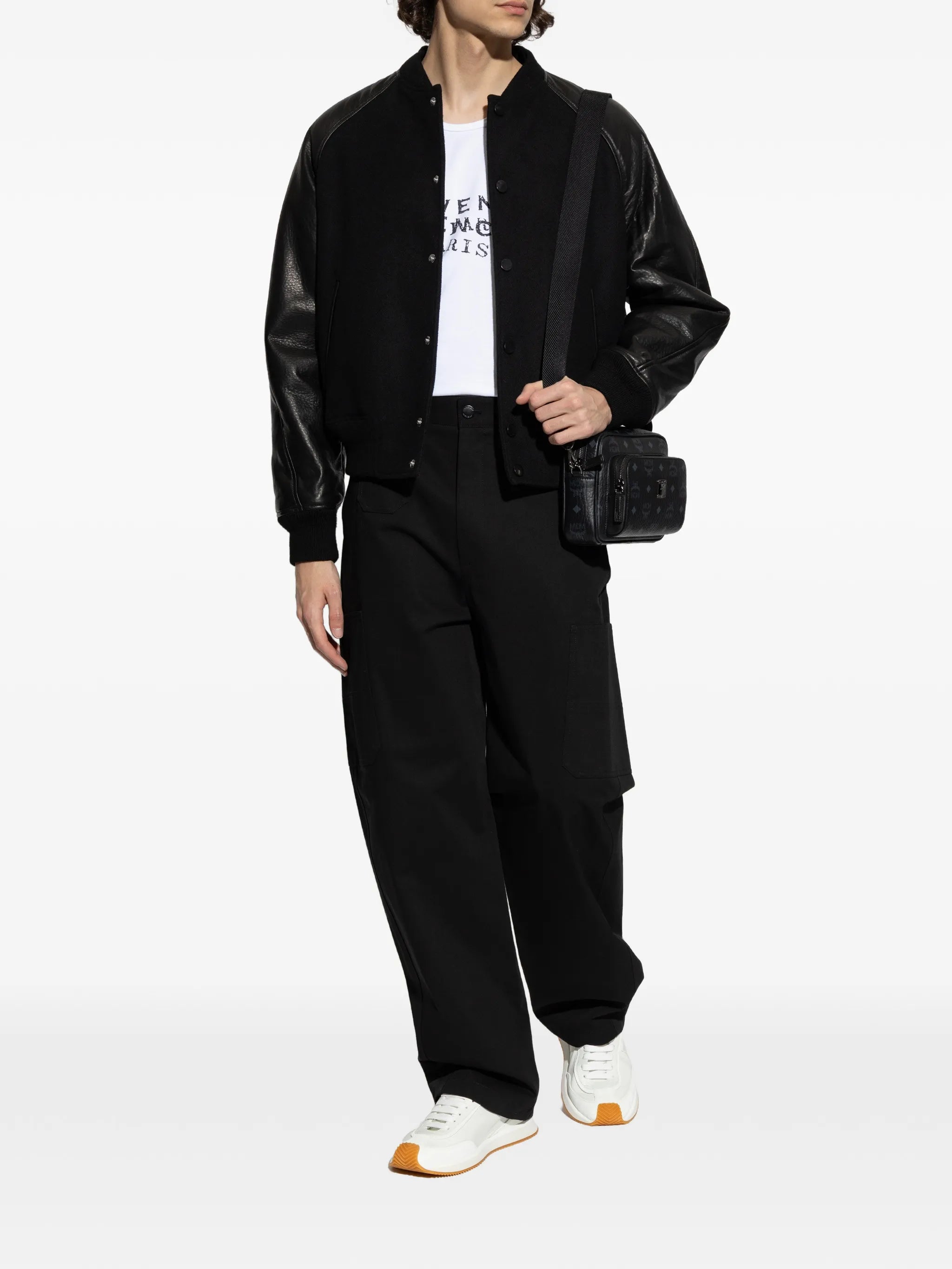Image of Bi-Material Black Bomber Jacket by Givenchy for Men - Season Spring-Summer 2026 - Model View 1