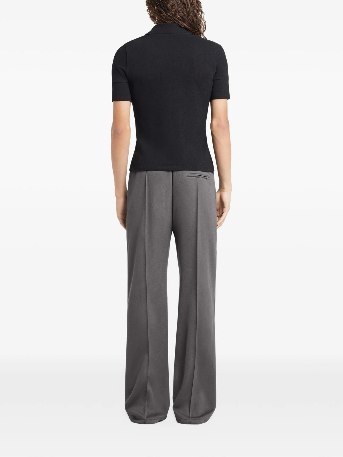 Image of Black Cotton Polo by Courrèges for Men - Season Spring-Summer 2026 - Model View 3