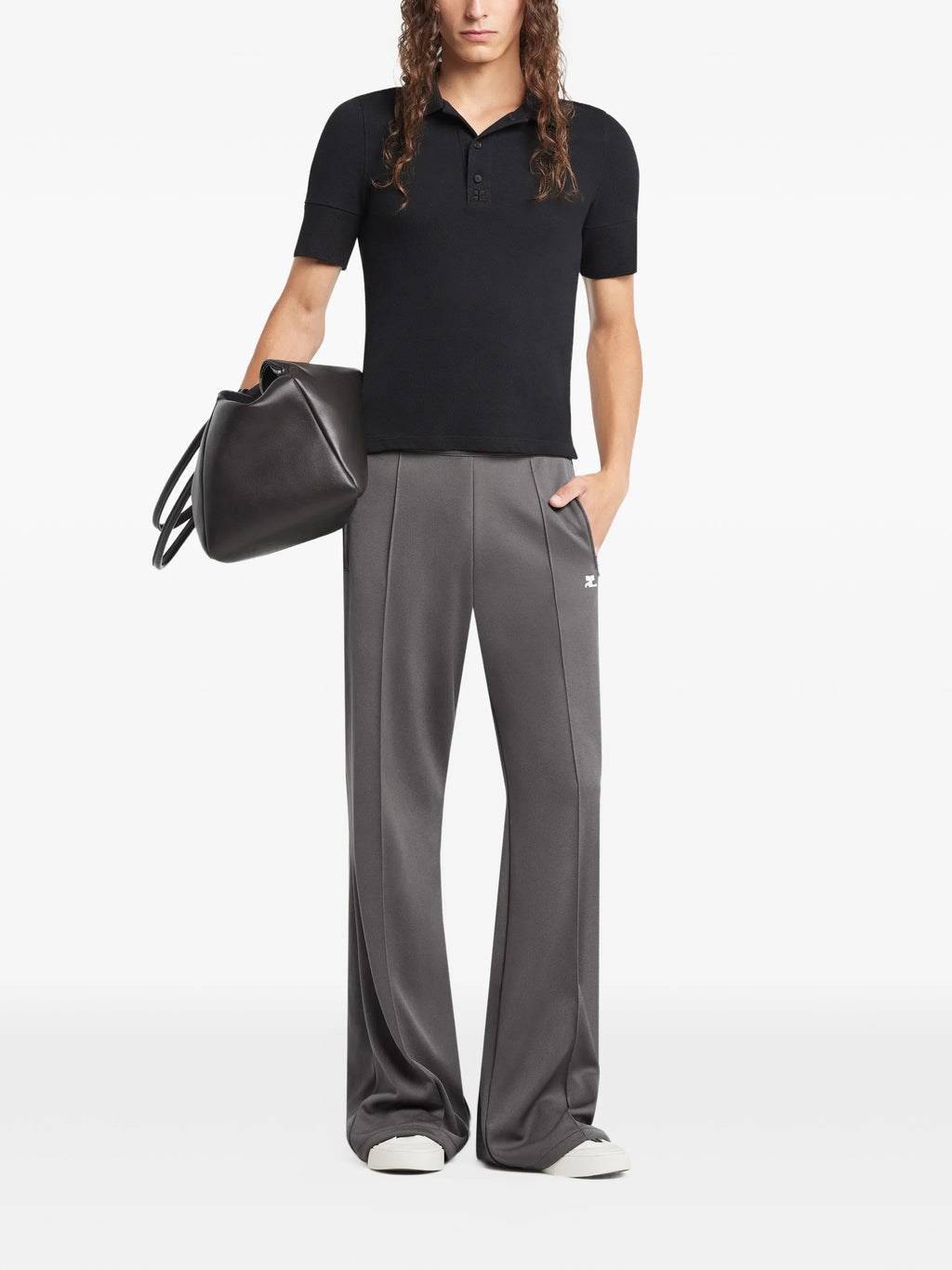 Image of Black Cotton Polo by Courrèges for Men - Season Spring-Summer 2026 - Model View 2