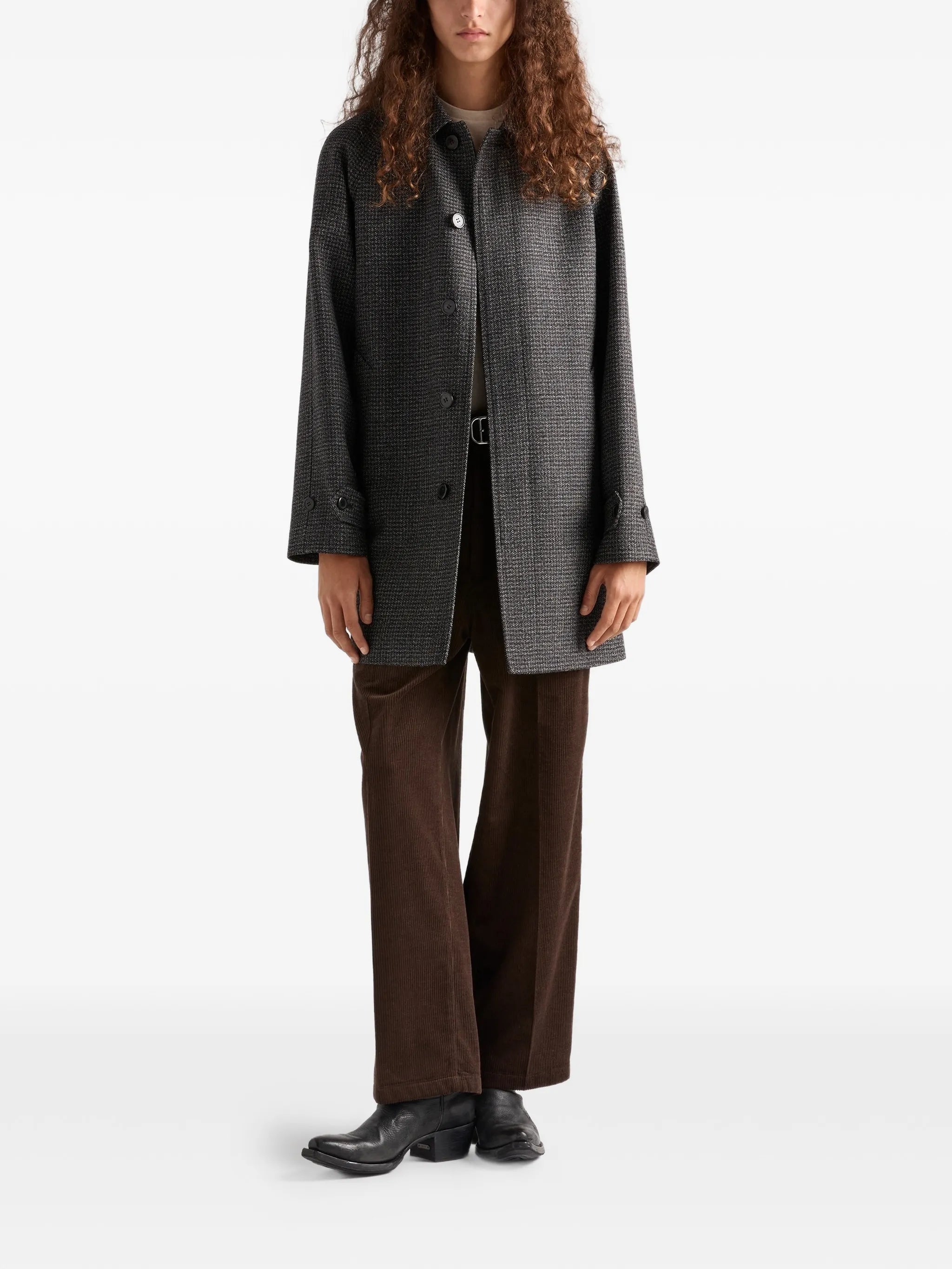 Image of Fine Checked Wool Coat by Prada for Men - Season Autumn-Winter 2025 - Model view 1