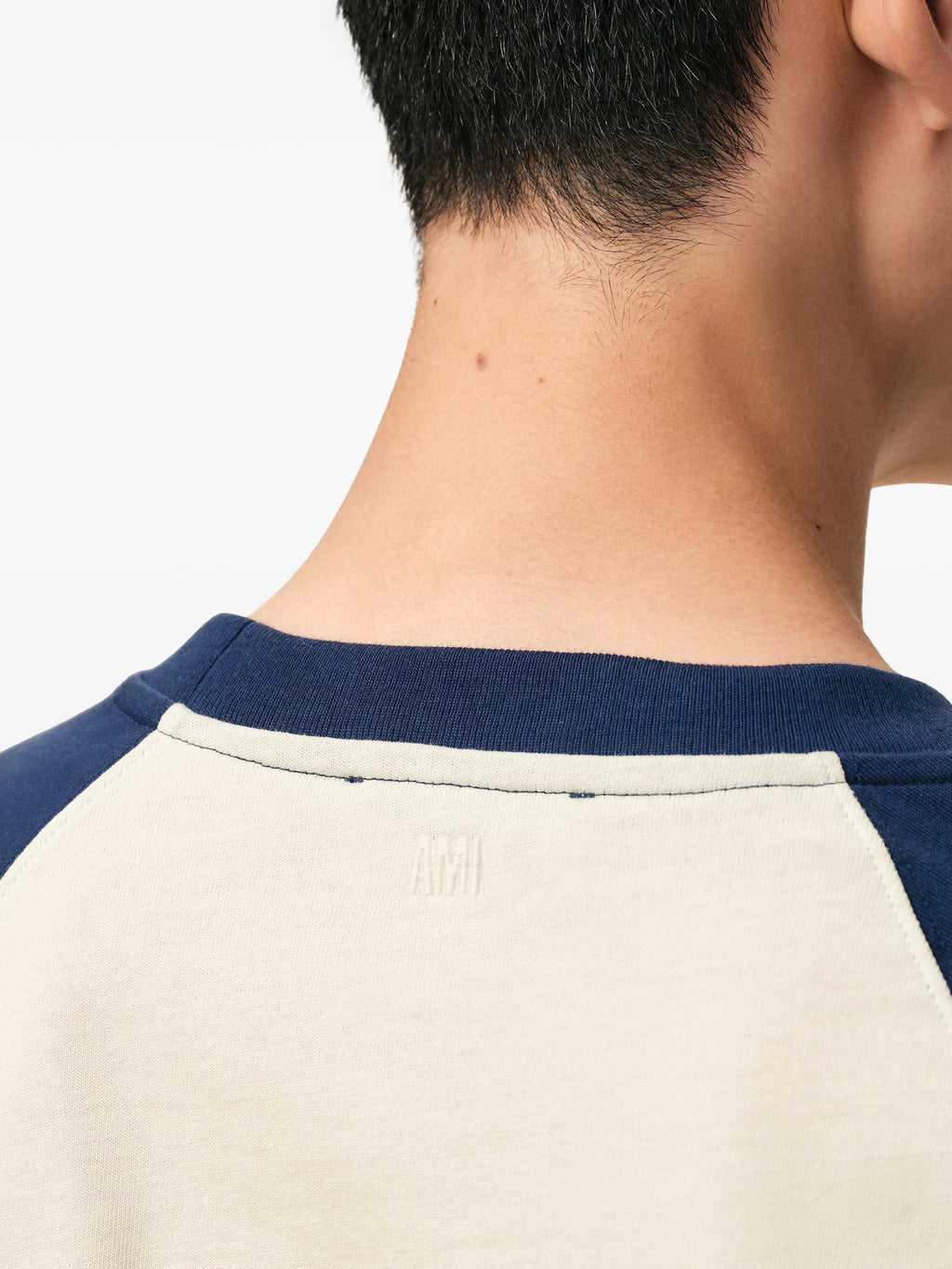 Image of White and Blue Cotton T-Shirt by Ami PARIS for Unisex - Season Spring-Summer 2026 - Model view 4