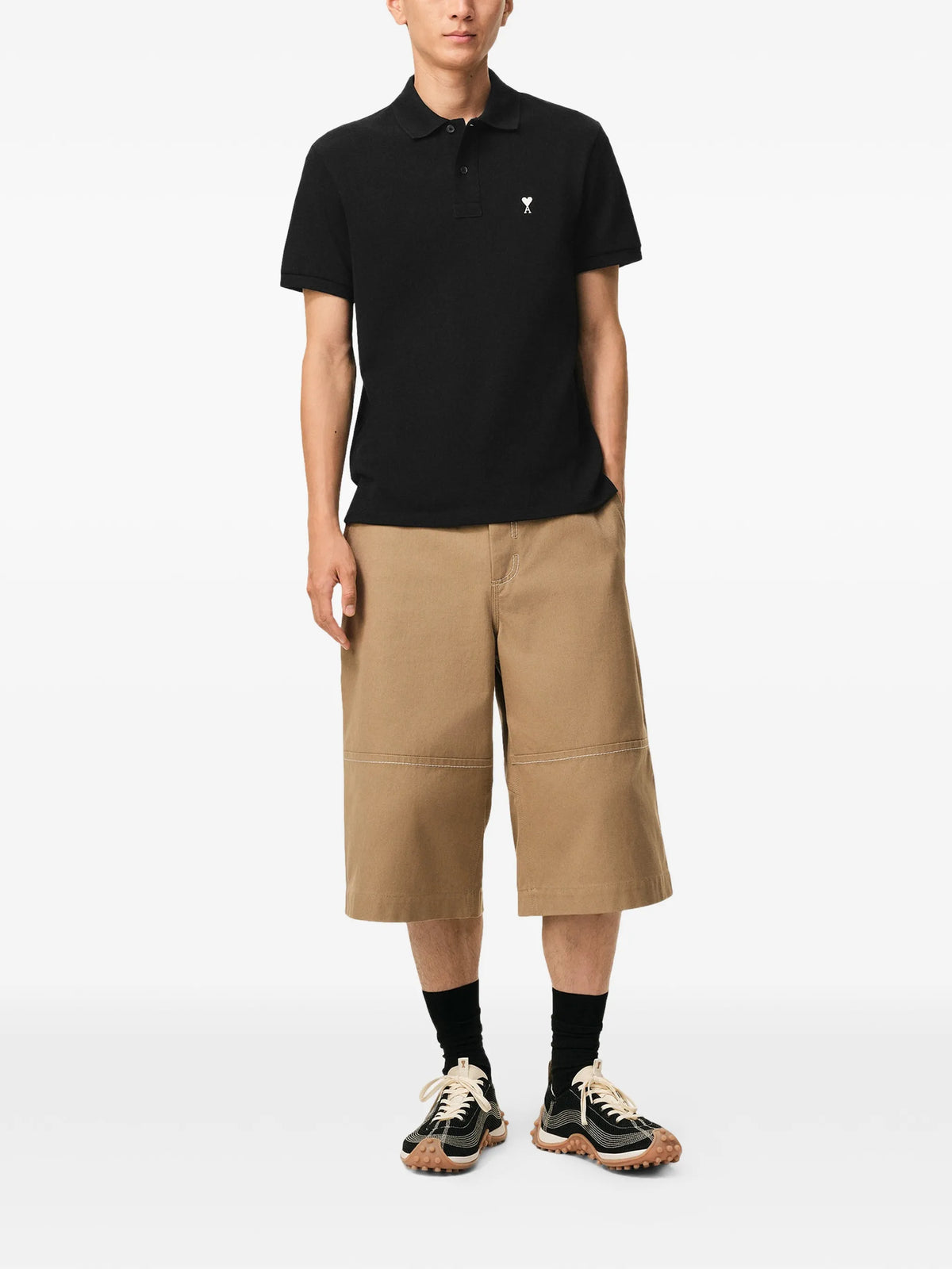 Image of Polo Ami de Coeur Black by Ami PARIS for Men - Season Spring-Summer 2026 - Model View 1