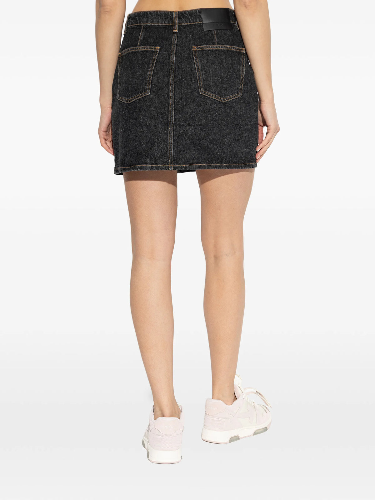 Image of Denim Mini Skirt by Iro for Women - Season Spring-Summer 2026 - Model View 3