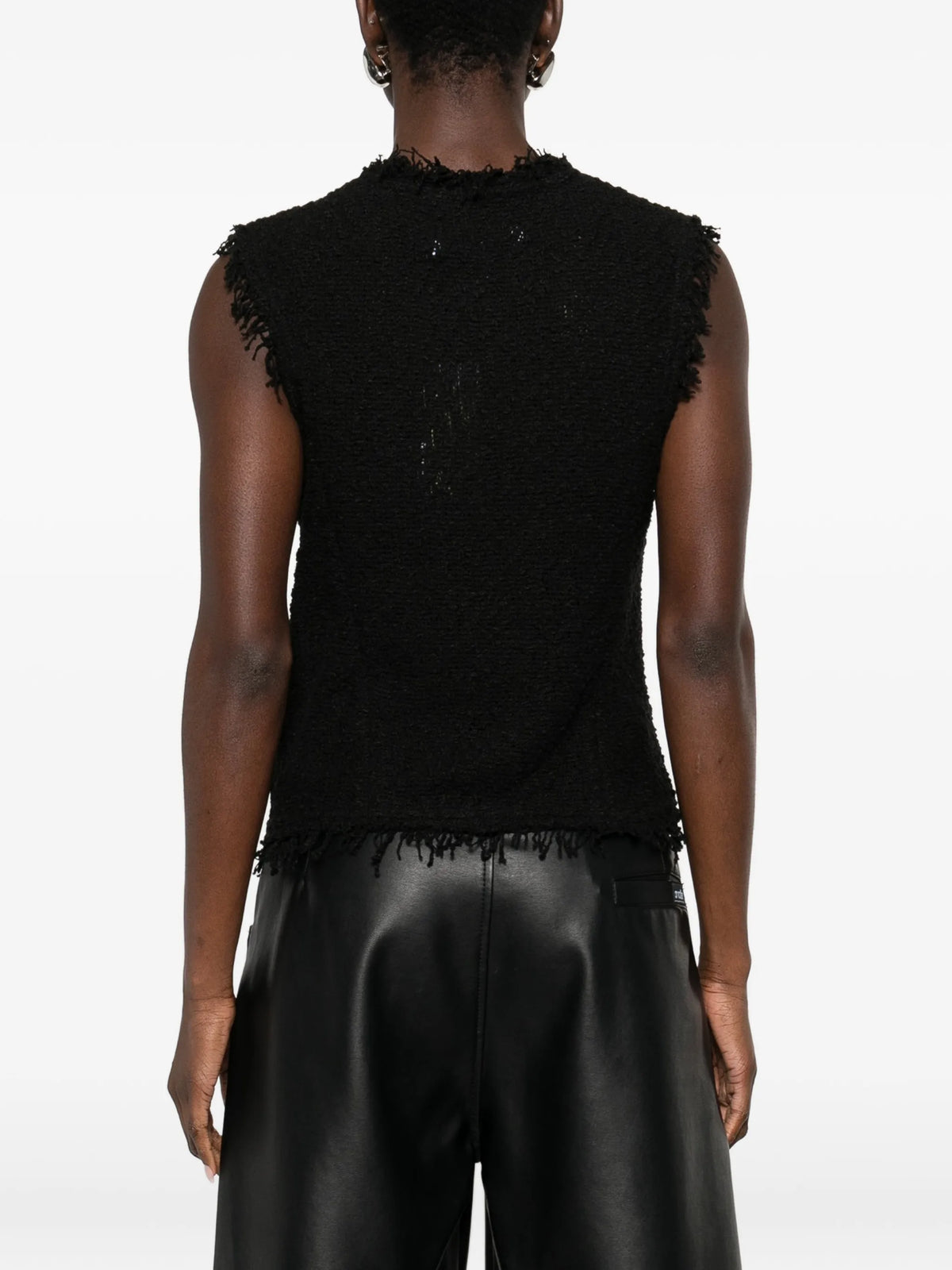 Image of Black Tweed Sleeveless Jacket by Iro for Women - Season Spring-Summer 2026 - Model View 3