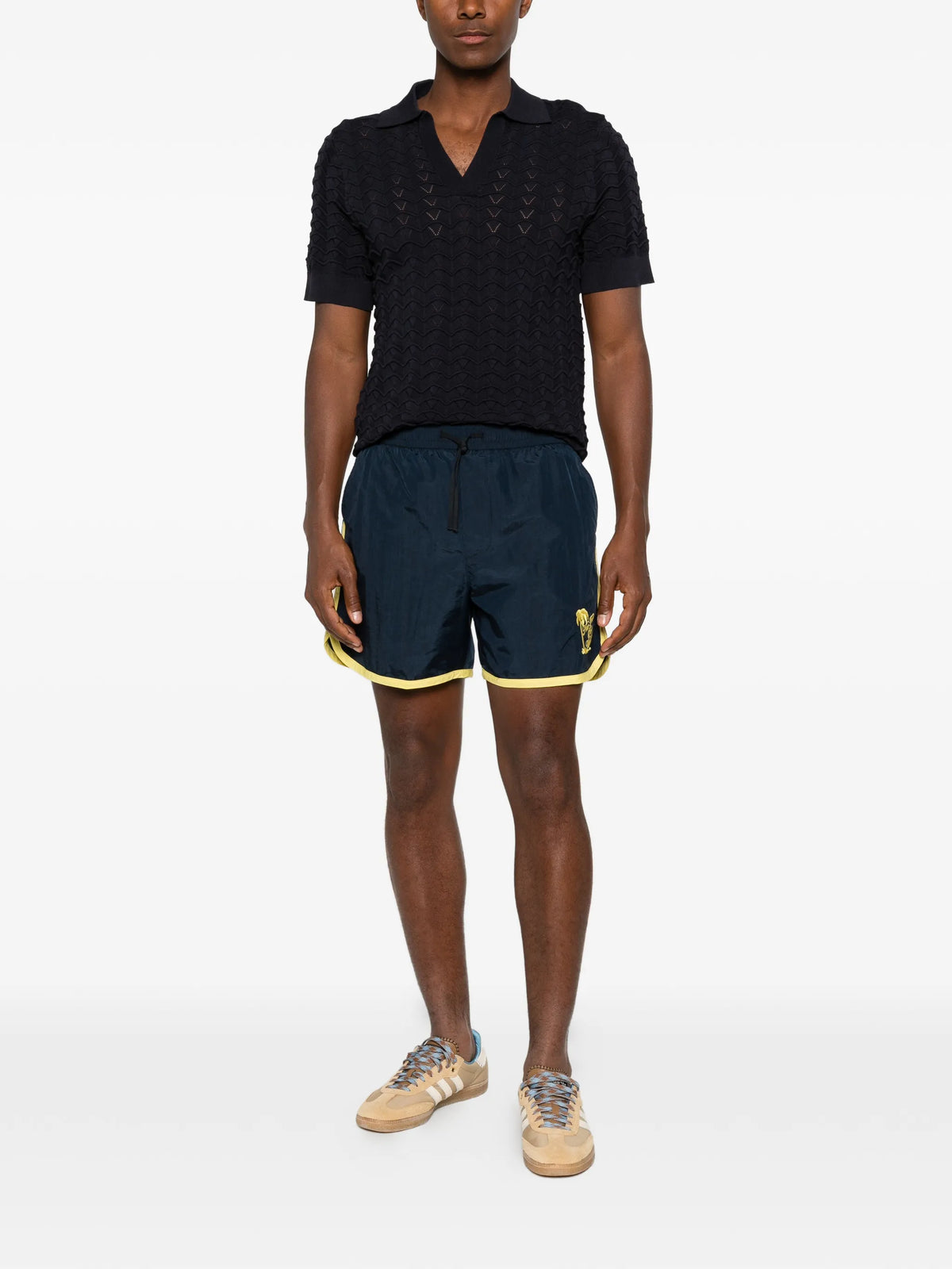 Image of Palmiers Swim Shorts - Drôle de Monsieur by Drole De Monsieur for Men - Season Spring-Summer 2026 - Model View 1