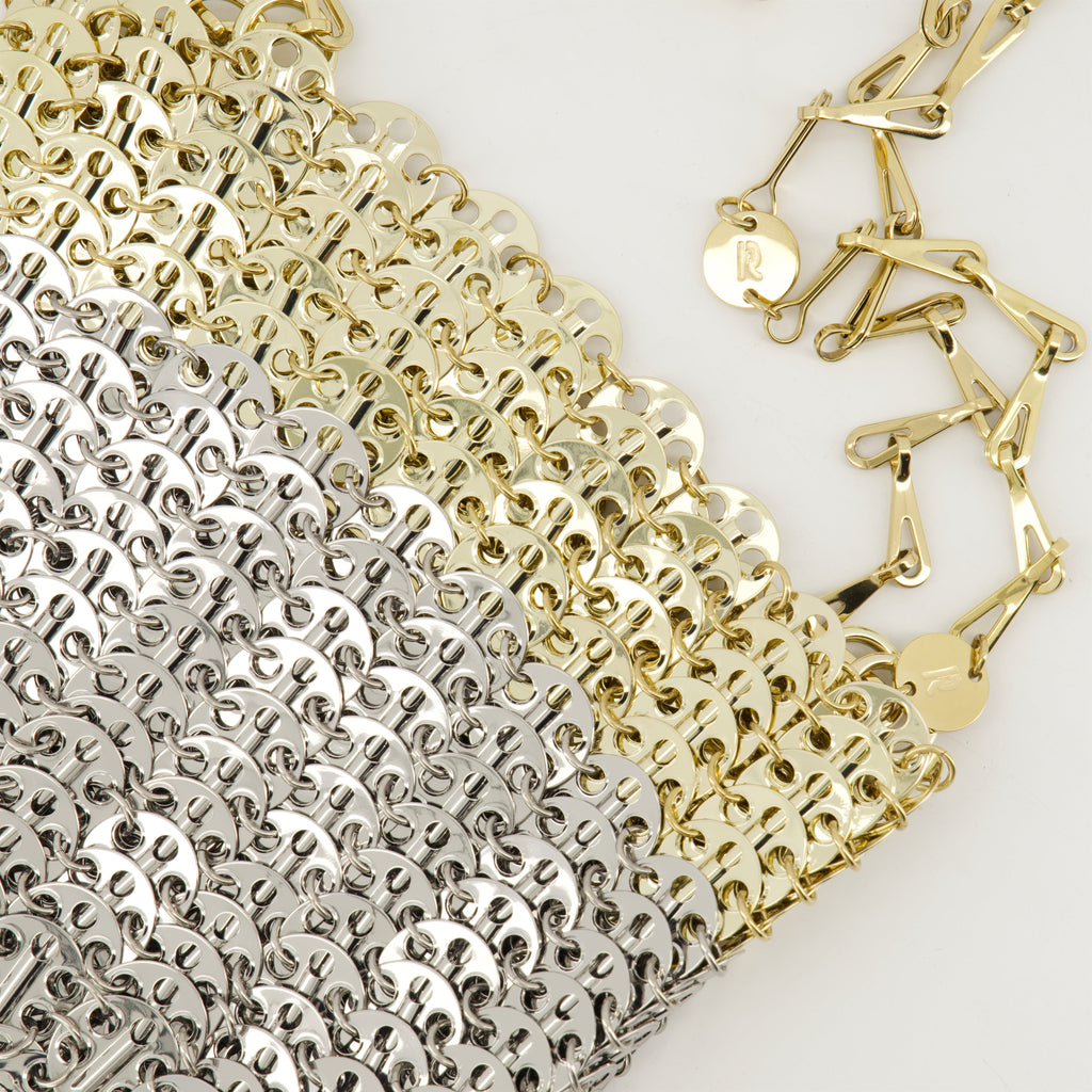 silver shoulder bag, Iconic Skyline 1969, designer handbag, sophisticated accessories, women's fashion