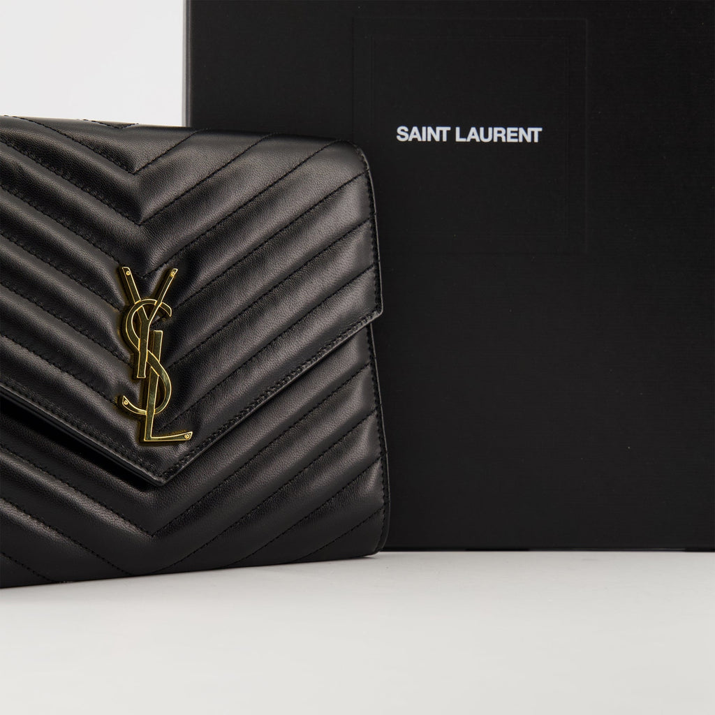 La Pochette Cassandre, Saint Laurent accessory, lambskin leather pouch, black leather clutch, designer handbag