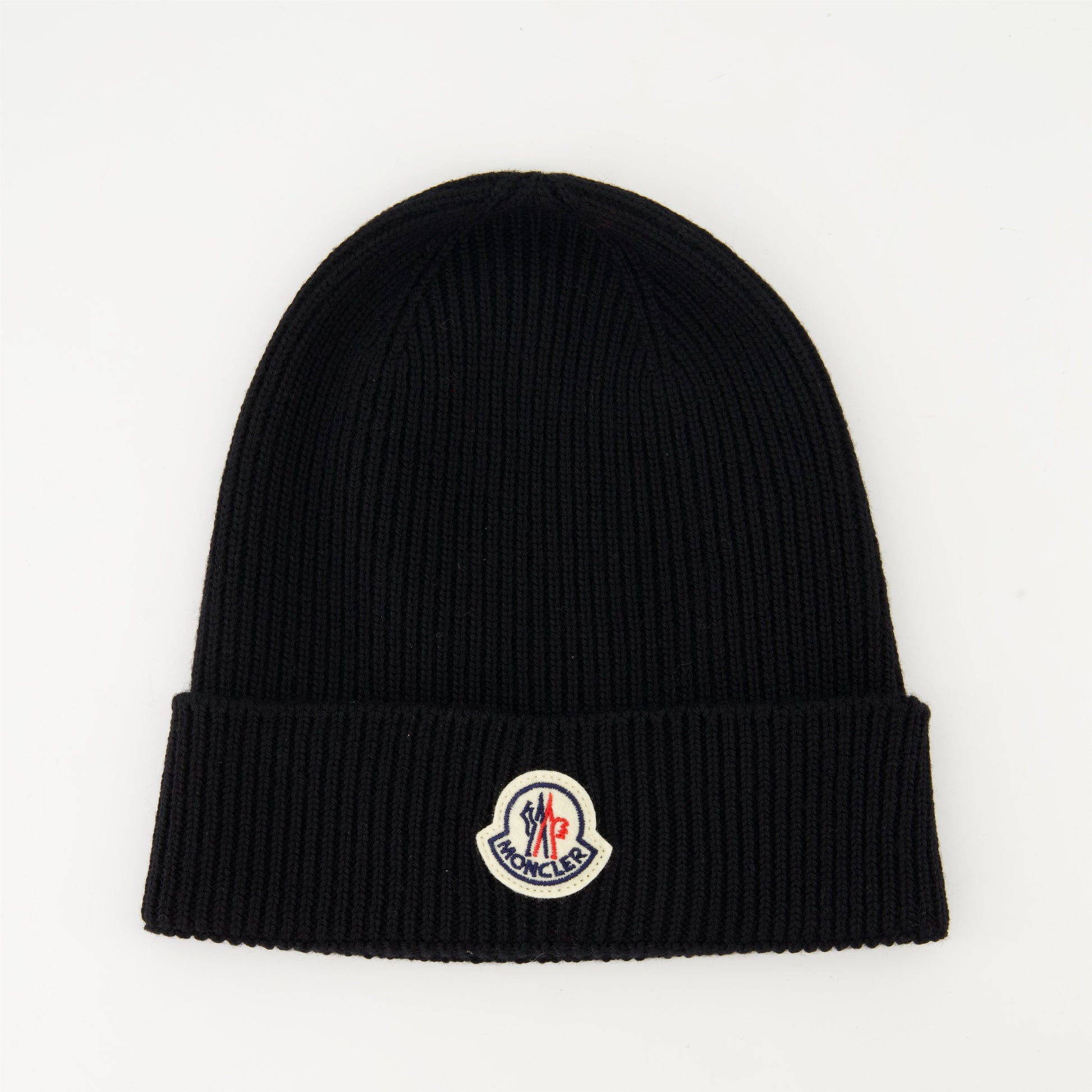   
Black wool beanie, Moncler beanie, luxury winter accessory, ribbed wool beanie, stylish logo hat  
