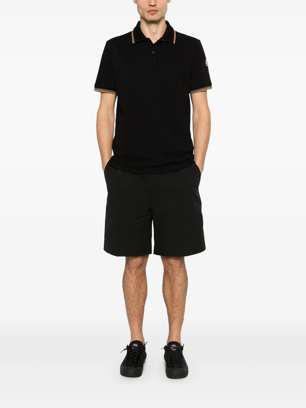 Image of Polo à col double noir by Moncler for Men - Season Spring-Summer 2026 - Model View 1