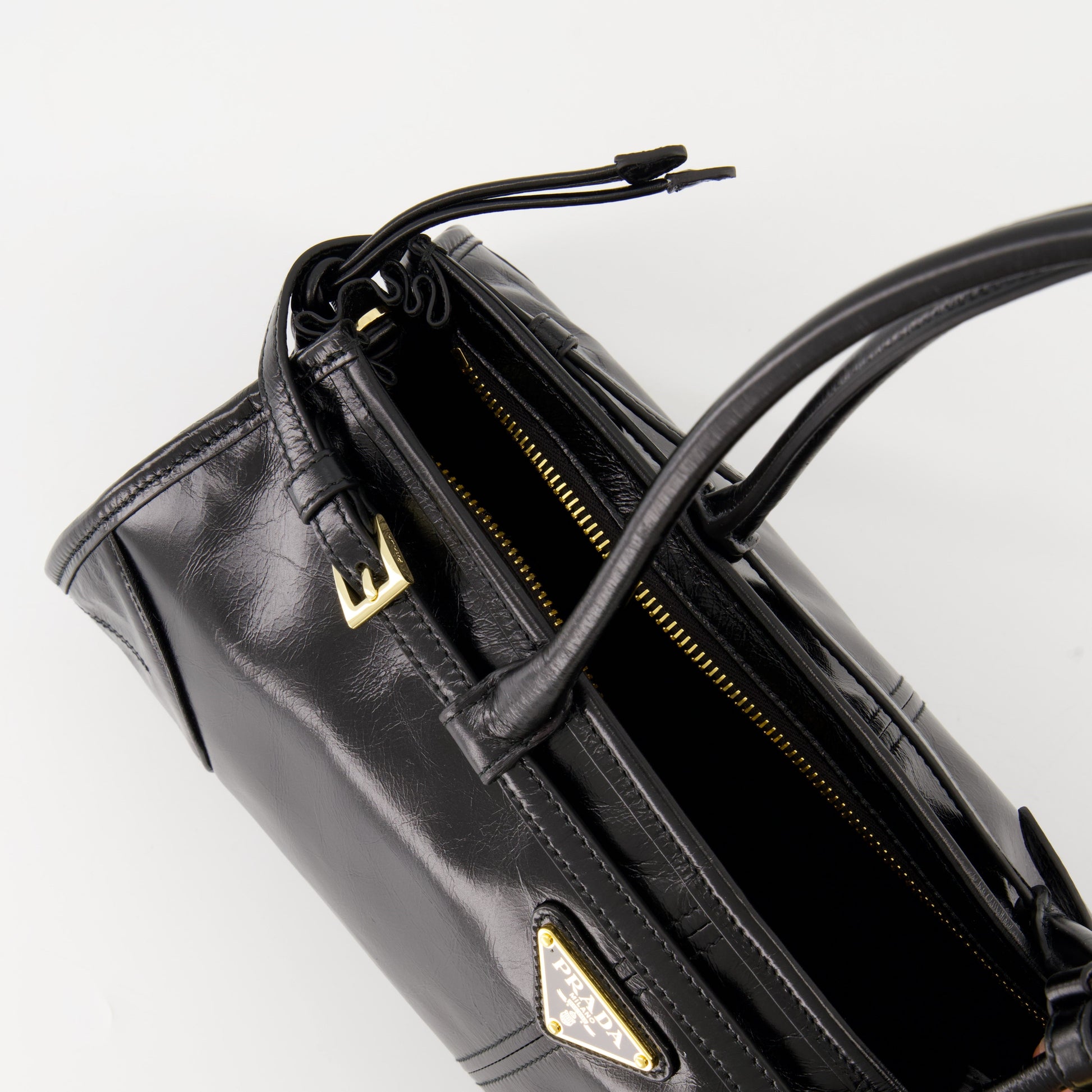 Prada handbag, black leather bag, luxury handbag, Autumn-Winter 2024, elegant accessory