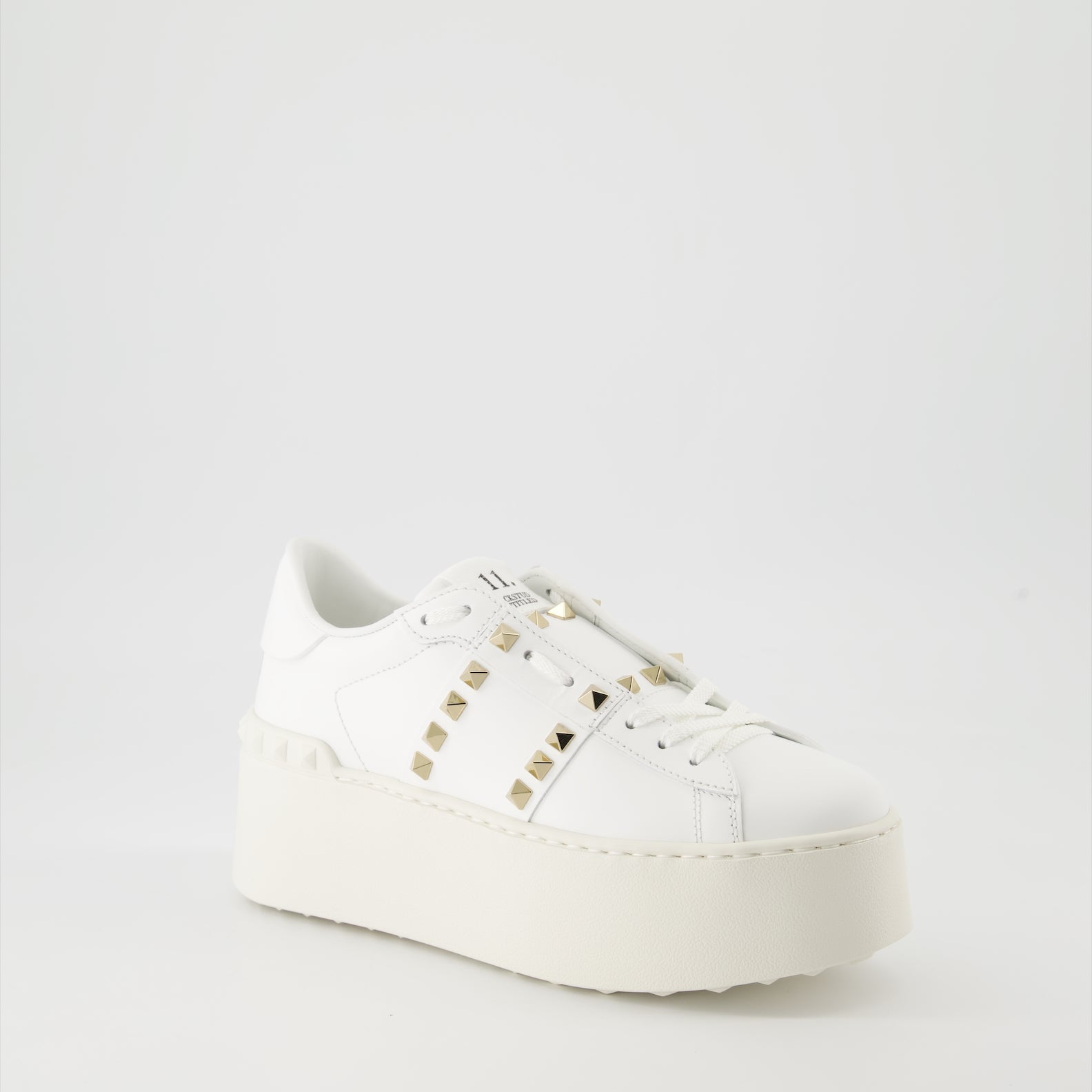 luxurious sneakers, Valentino Garavani, white leather shoes, Rockstud sneakers, flatform sneakers