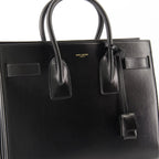 Image of Sac de Jour Small Noir by Saint Laurent for Women - Season Spring-Summer 2025 - Detail View 1