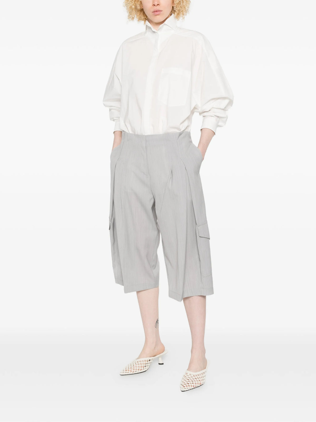 Image of Large Pleated Bermuda Shorts by Iro for Women - Season Spring-Summer 2026 - Model View 1