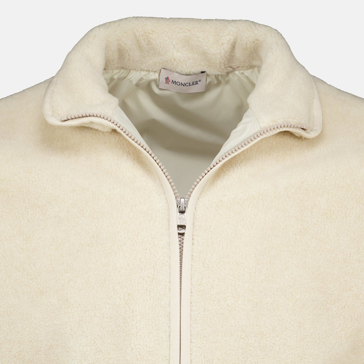 Chaqueta beige con cremallera