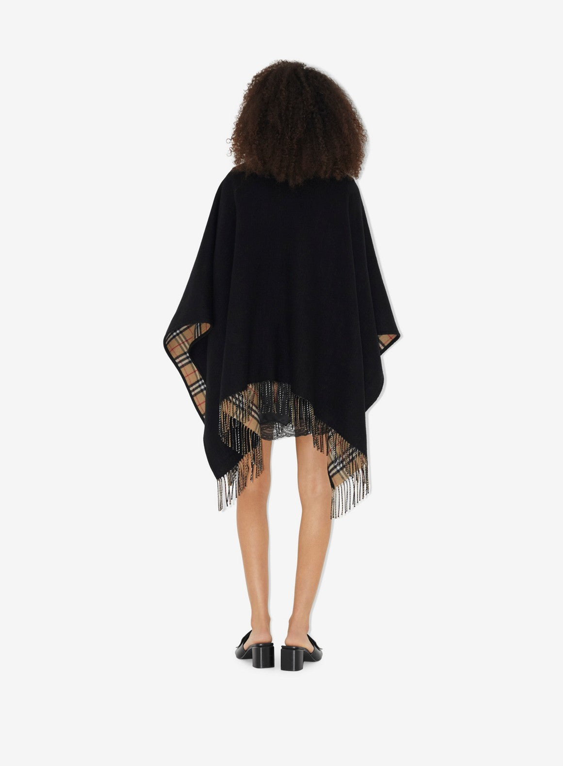 black wool poncho, Burberry checkered poncho, luxury outerwear, high-end fashion poncho, timeless wool poncho