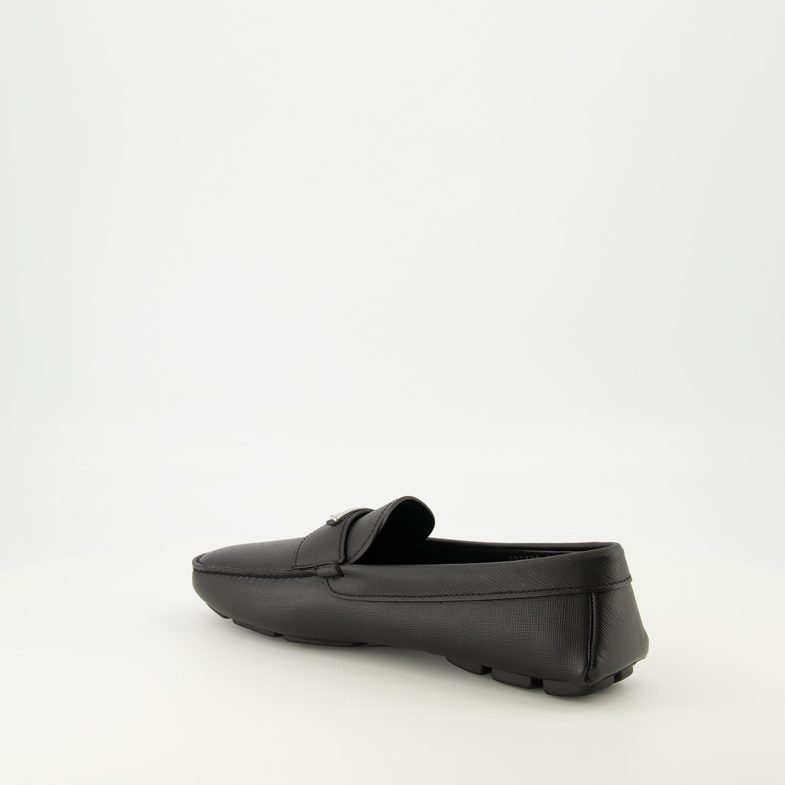 Image of Prada Black Leather Moccasins by Prada for Men - Season Spring-Summer 2026 - Back Right Three-Quarter View