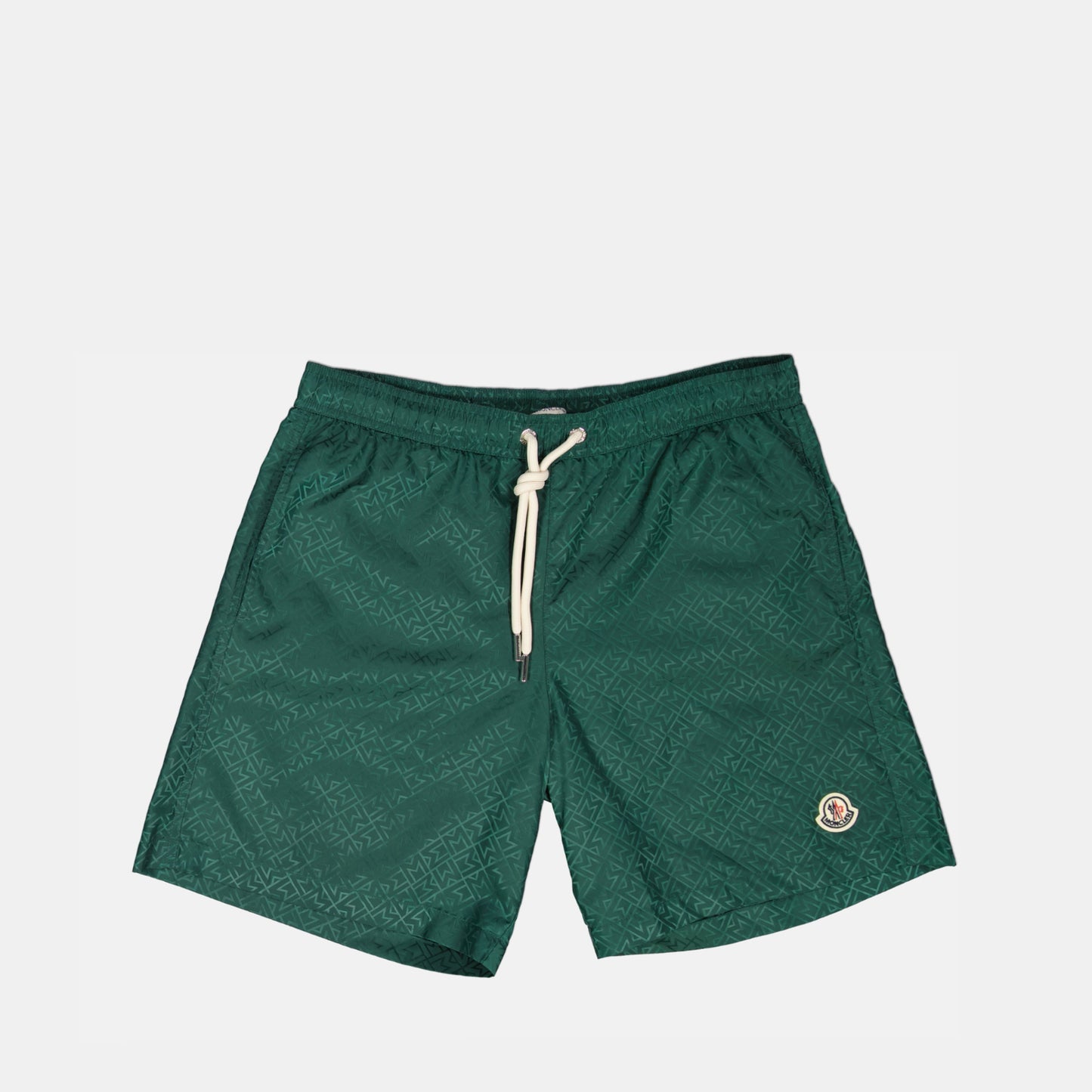 Monogram swim shorts, Moncler swimwear, green swim shorts, sustainable swimwear, jacquard nylon shorts