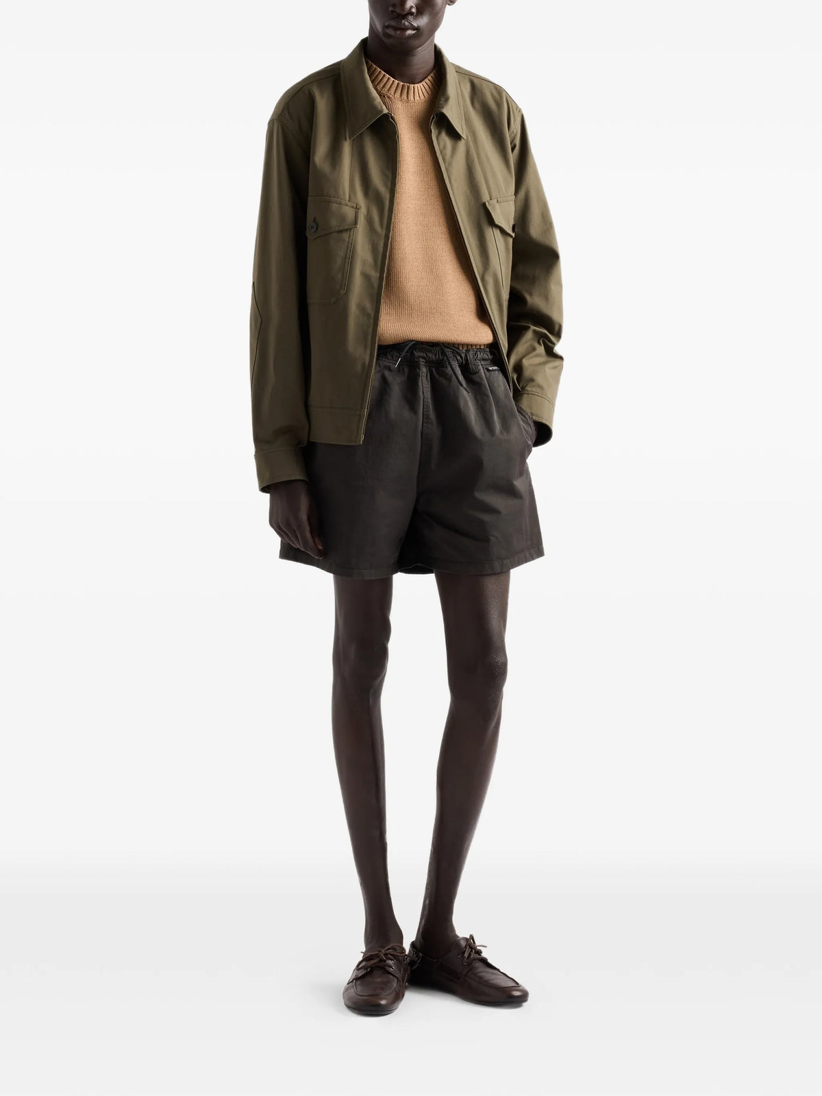 Image of Brown Knit Sweater by Prada for Men - Season Autumn-Winter 2026 - Model View 1