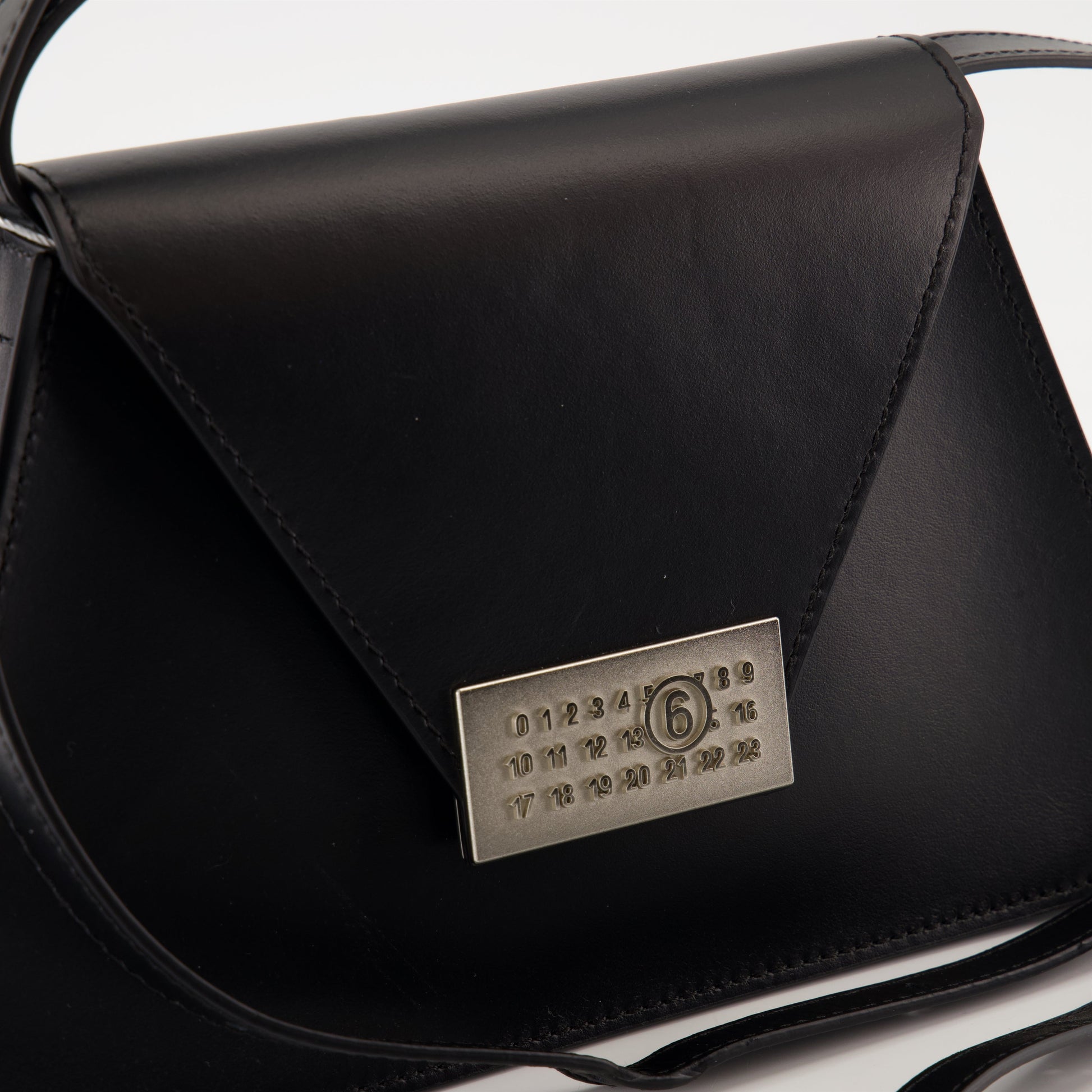 leather shoulder bag, MM6 collection, luxury accessories, adjustable strap, black designer bag