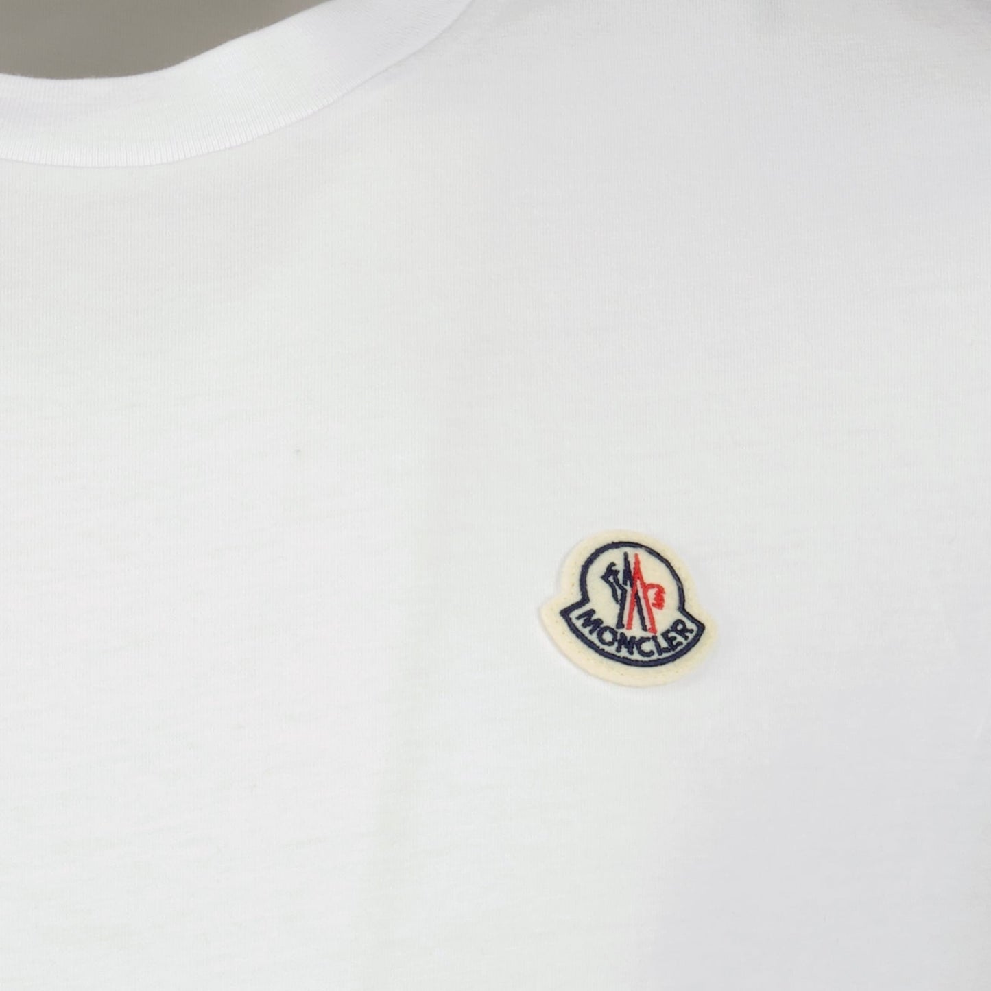 Cotton t-shirts, Moncler logo tees, casual essentials, three-pack shirts, premium cotton wear