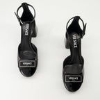 black patent leather heels, Versace shoes, adjustable ankle strap heels, elegant footwear, Spring-Summer collection
