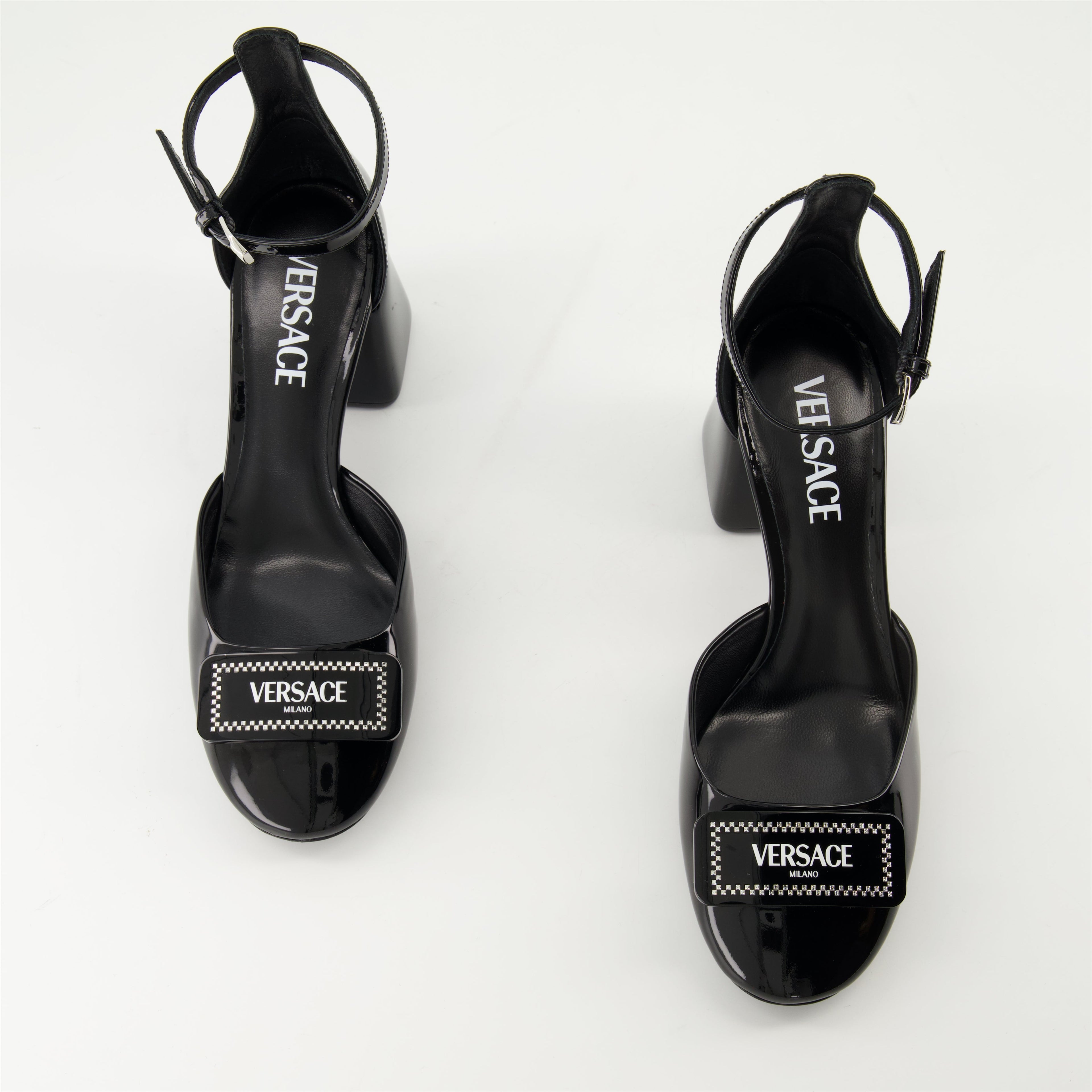 black patent leather heels, Versace shoes, adjustable ankle strap heels, elegant footwear, Spring-Summer collection