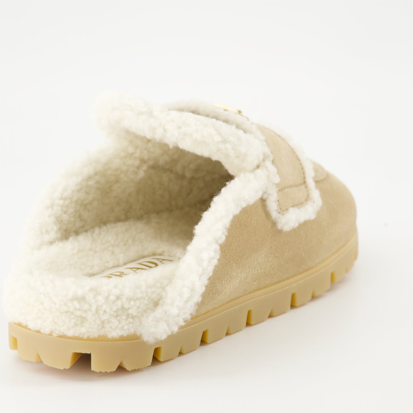 luxury mules, shearling mules, Prada footwear, Autumn-Winter shoes, beige mules