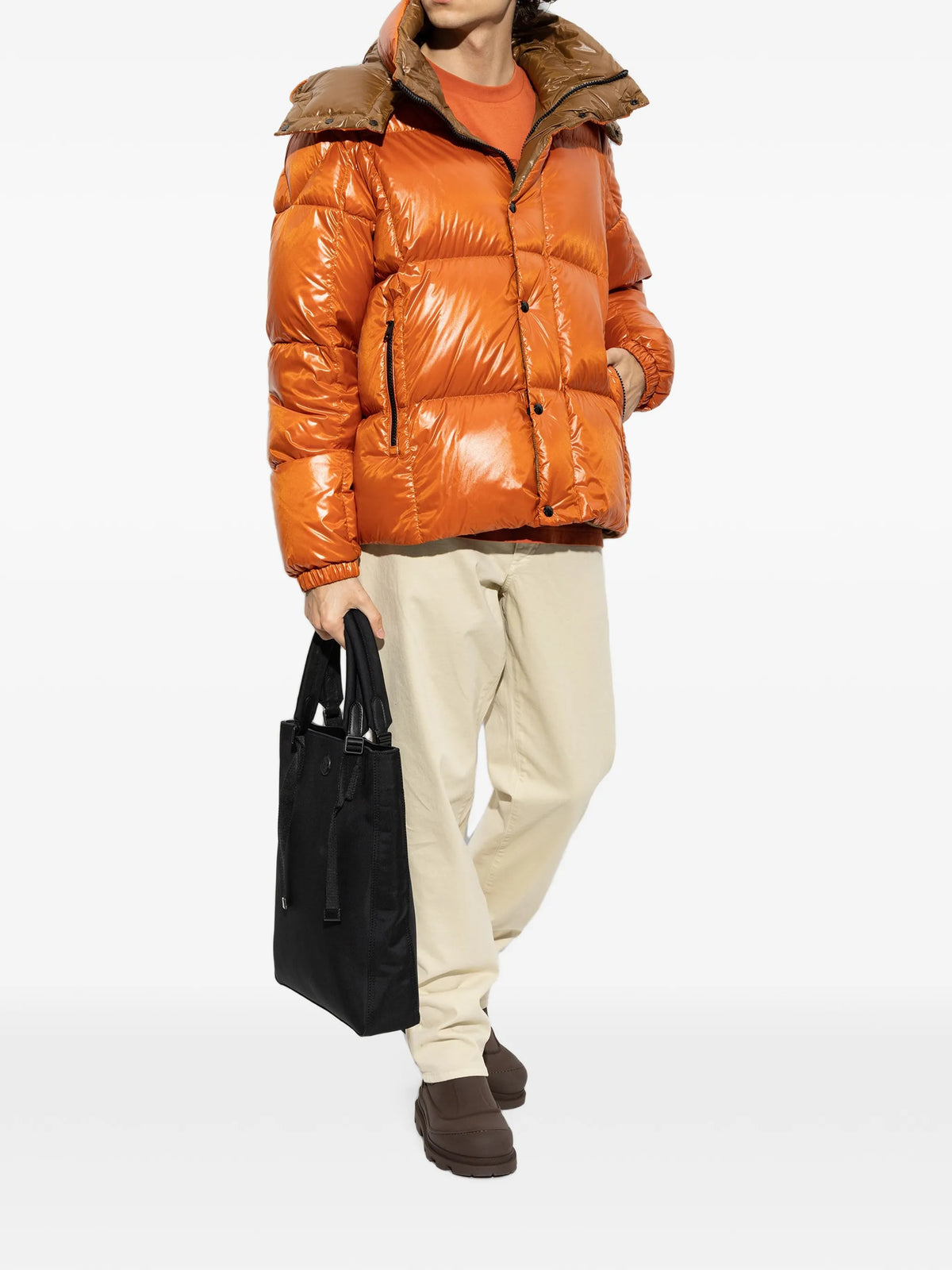 Image of Parana Orange Down Jacket by Moncler for Men - Season Autumn-Winter 2026 - Model View 1