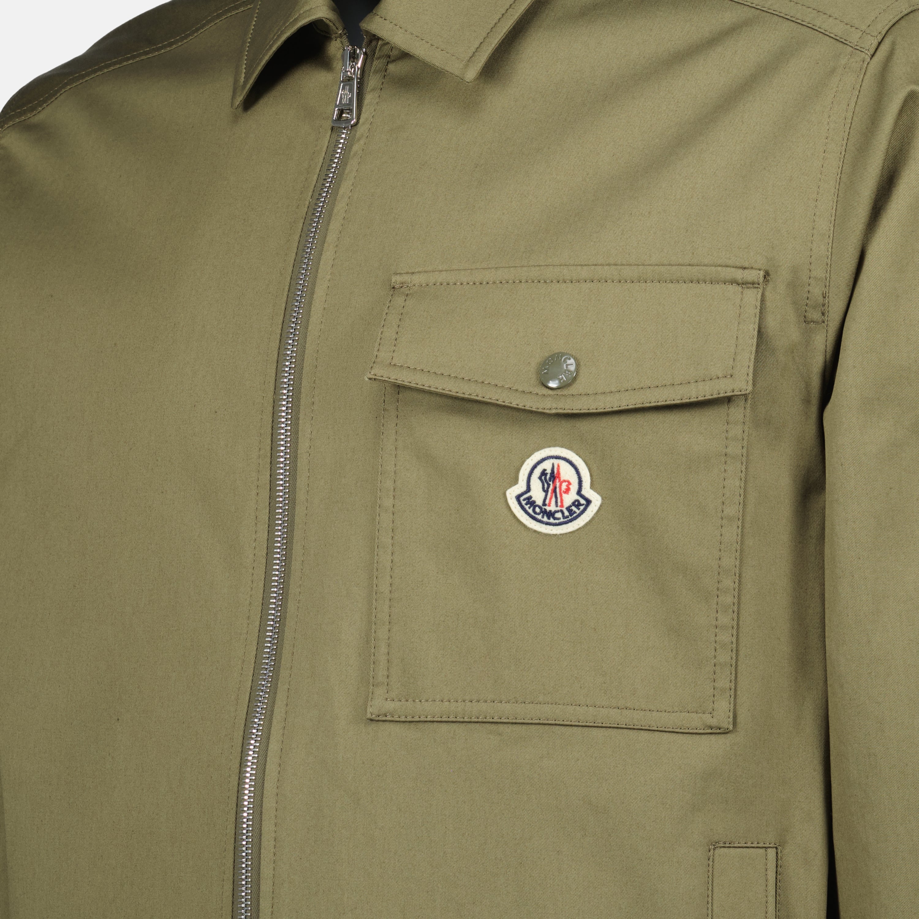 olive green overshirt, Moncler jacket, classic collar, double zipper, Spring-Summer 2025