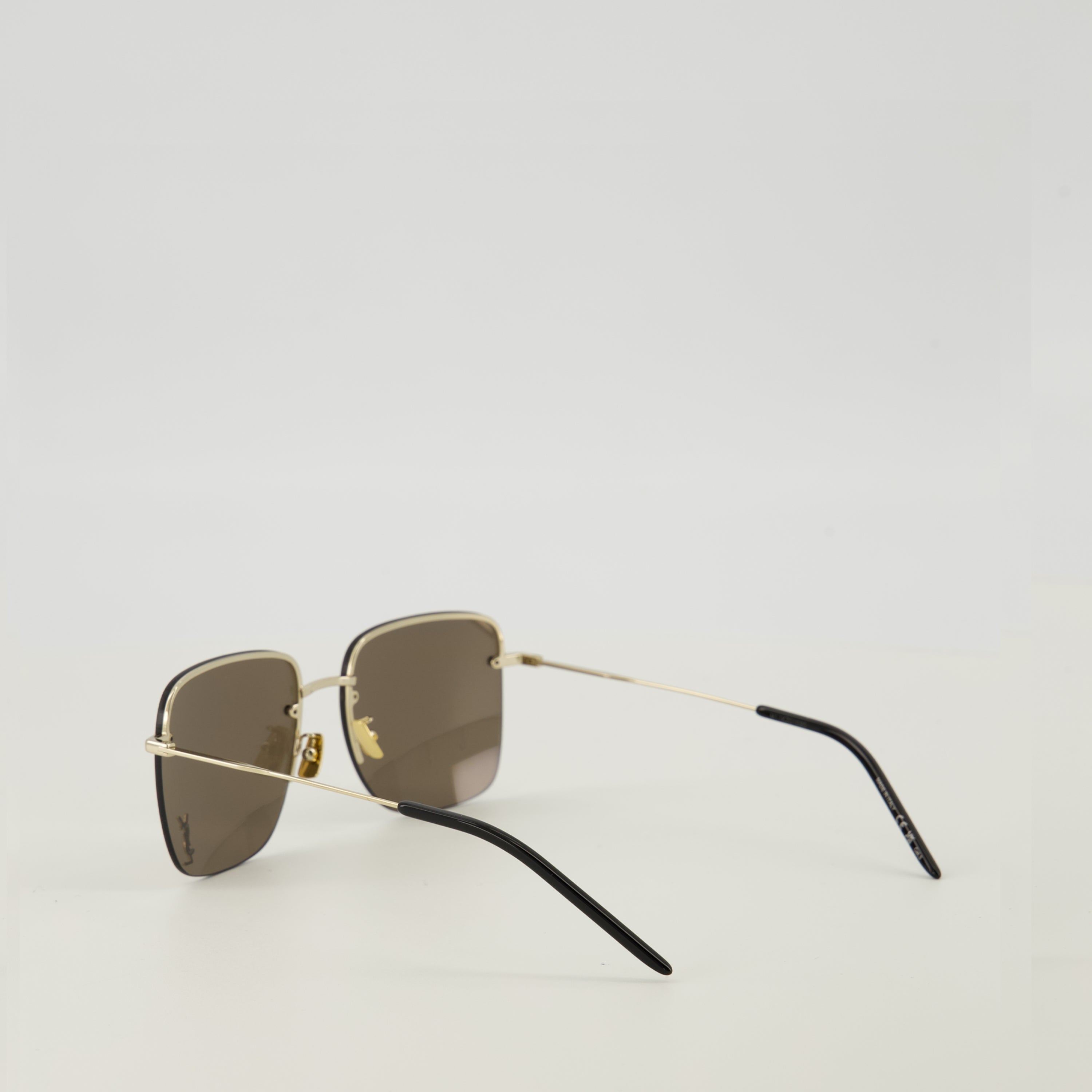 Image of SL312 M Gold Sunglasses by Saint Laurent for Unisex - Season Spring-Summer 2026 - Detail View 1