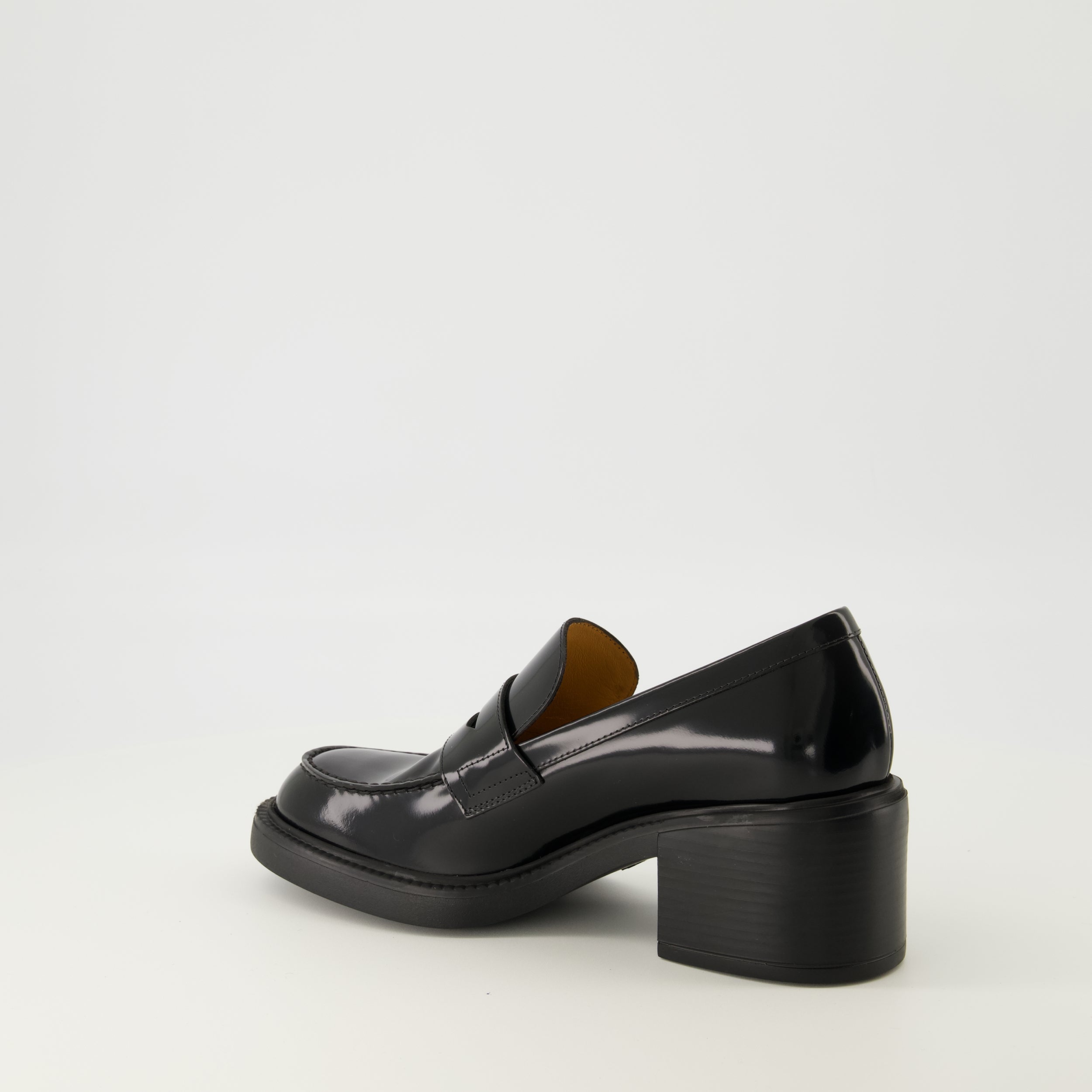 black leather moccasins, Tod's footwear, elegant slip-on shoes, autumn winter collection, women's moccasins