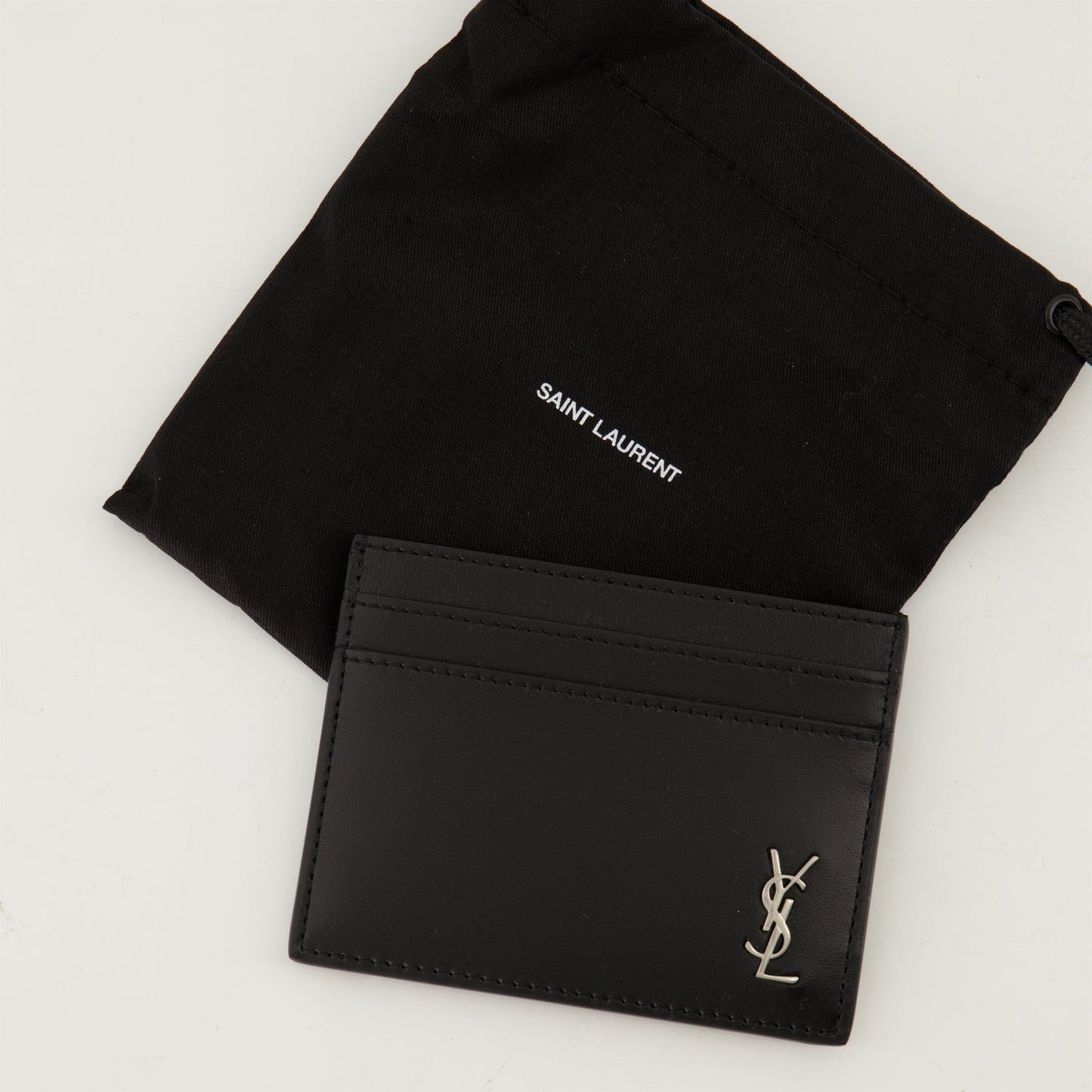 leather card holder, Saint Laurent, card holder black, metallic logo card holder, sophisticated accessory