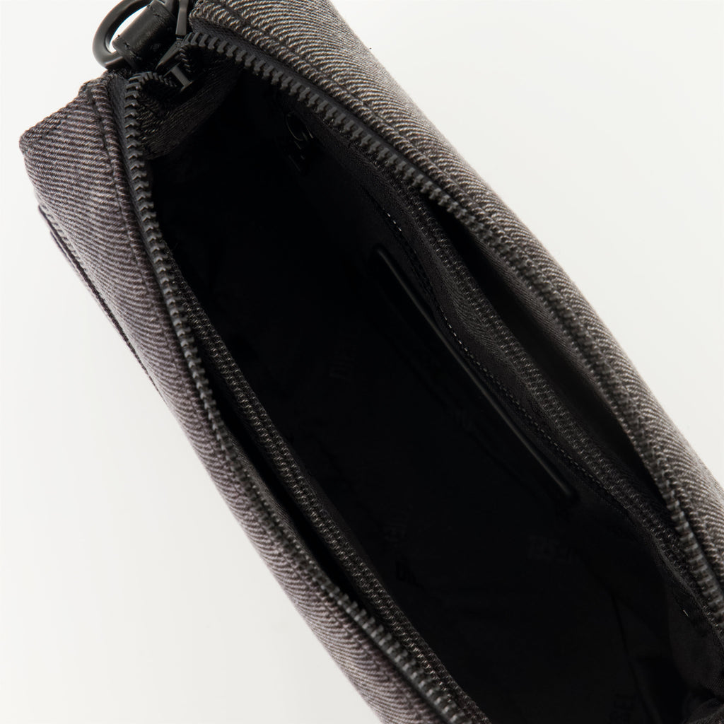 denim camera bag, adjustable shoulder strap, unisex accessory, oval D logo, Spring-Summer 2025 collection