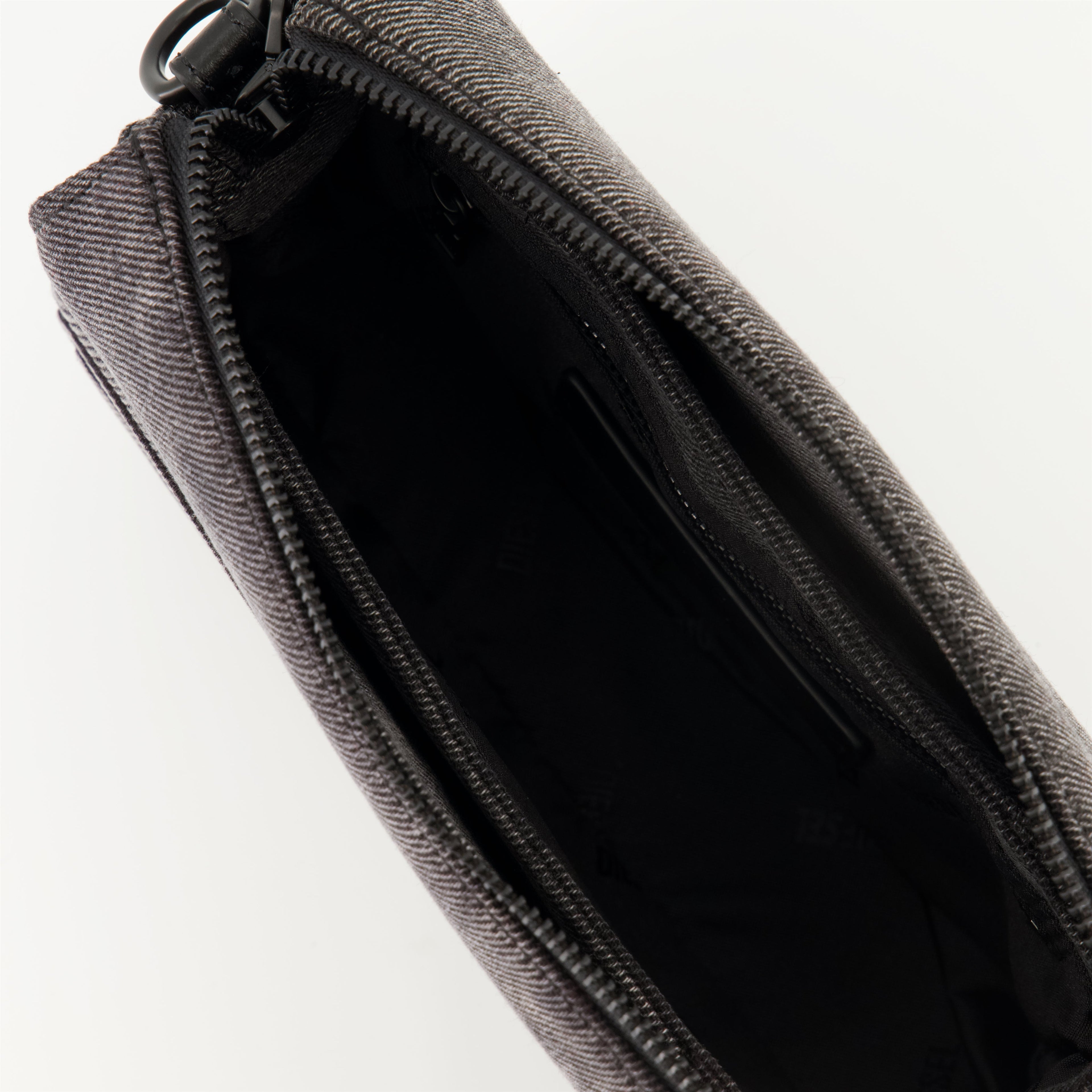 denim camera bag, adjustable shoulder strap, unisex accessory, oval D logo, Spring-Summer 2025 collection