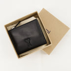 Image of Black Leather Wallet with Rivet Detail by Ami PARIS for Unisex - Season Spring-Summer 2025 - Detail View 2