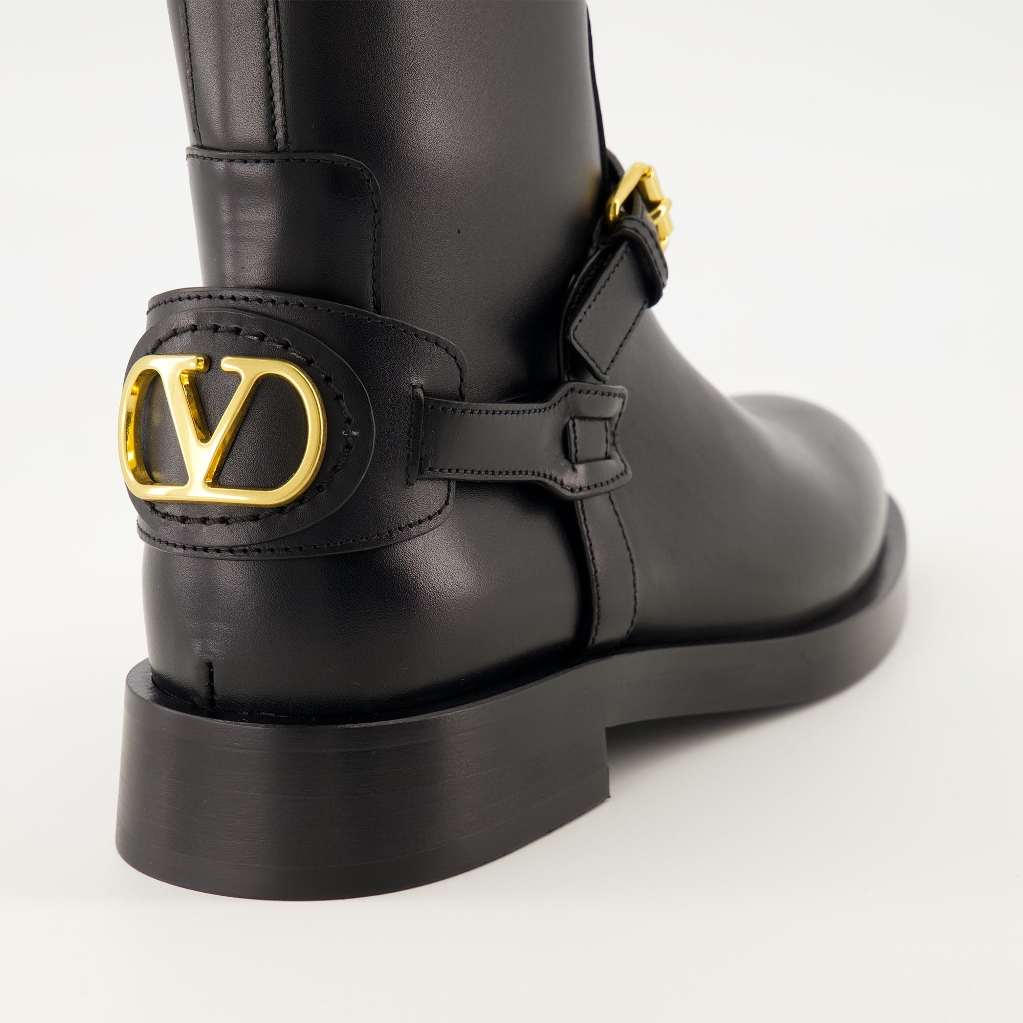 VLogo ankle boots, Valentino Garavani shoes, black leather boots, elegant footwear, designer ankle boots