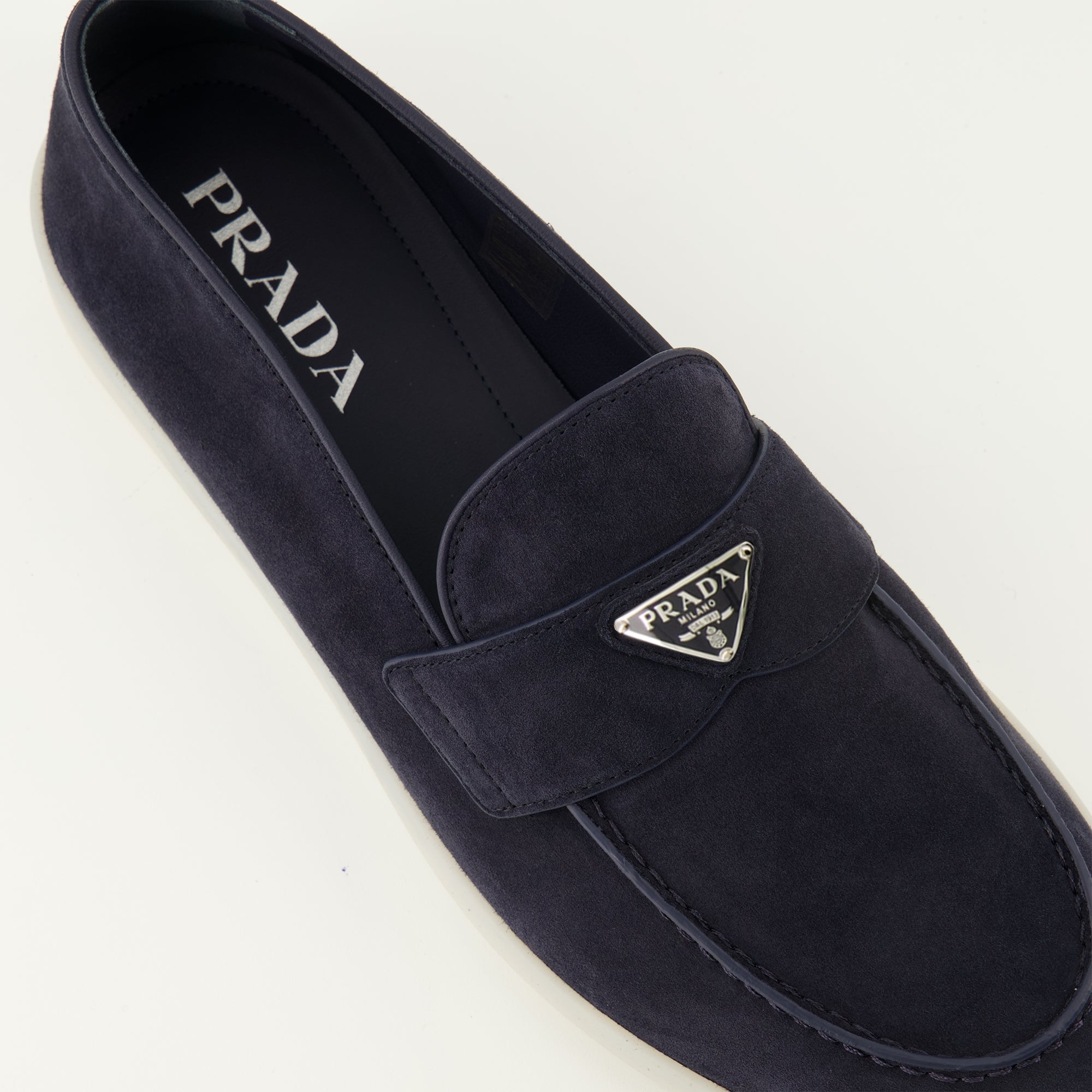 Prada loafers, navy blue suede shoes, slip-on footwear, triangle logo, men's designer shoes