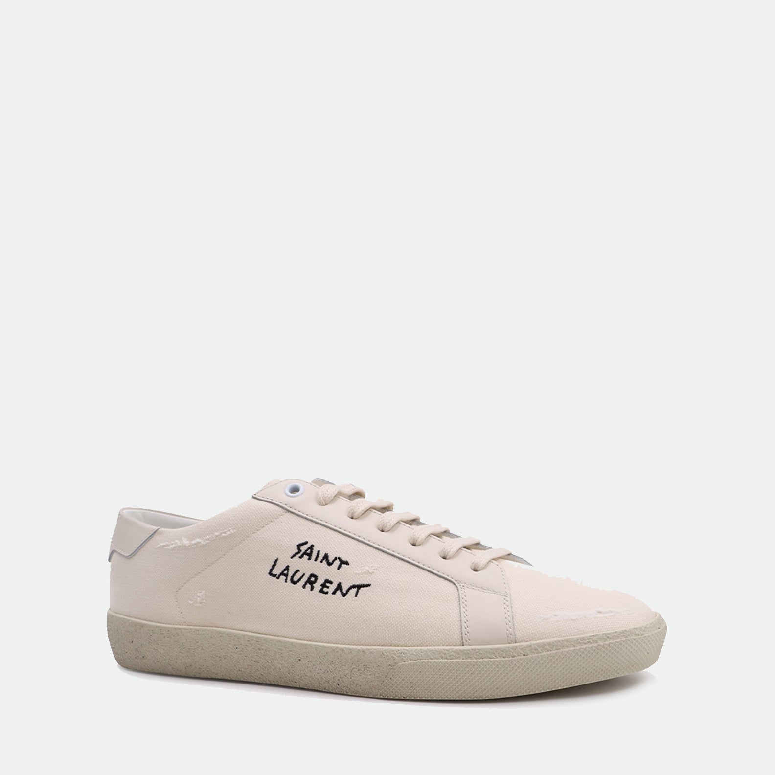 1. Classic sneakers
2. Cotton canvas shoes
3. Saint Laurent footwear
4. Luxury casual sneakers
5. Beige sneakers