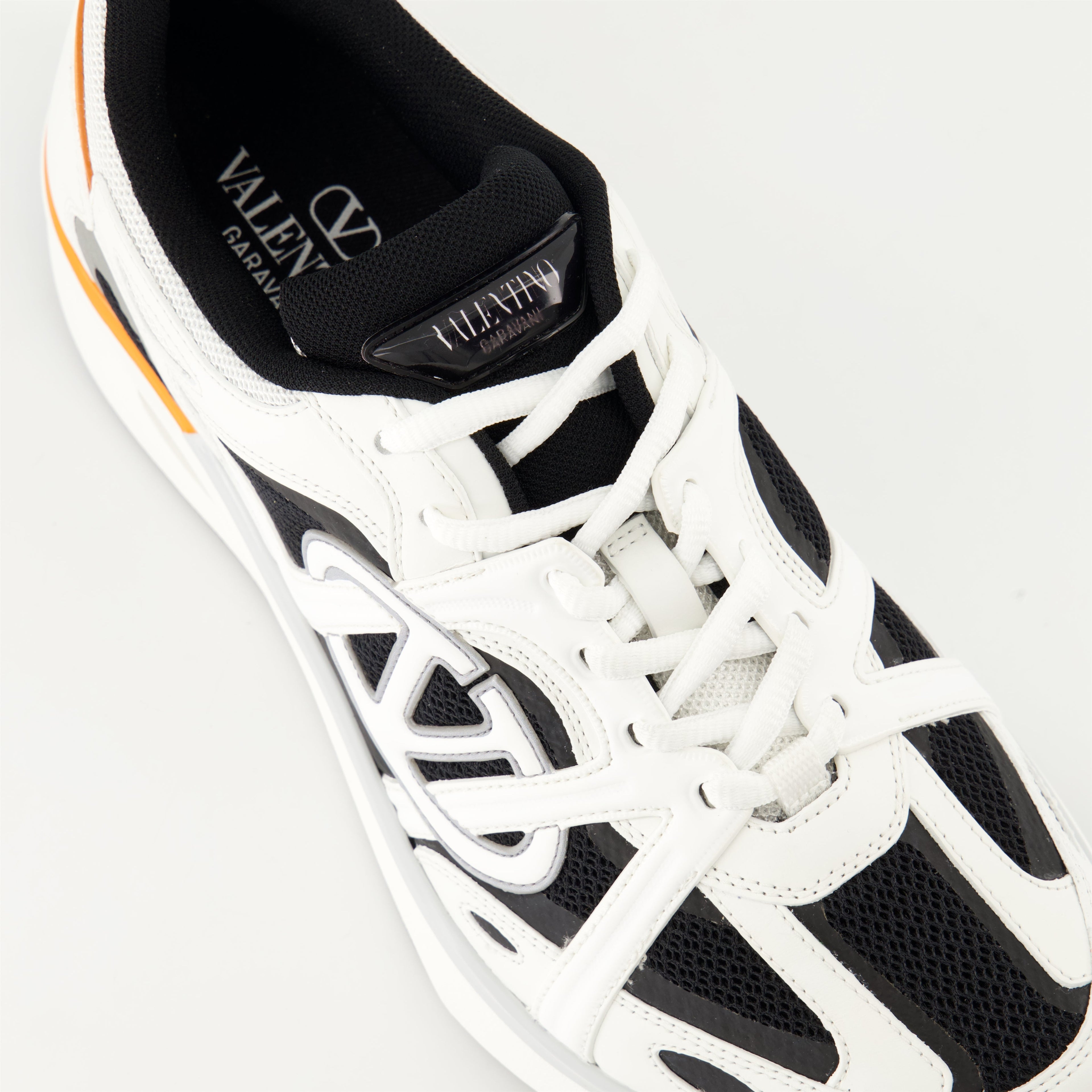 Image of White and Black VLogo Easyjog Sneakers by Valentino Garavani for Men - Season Autumn-Winter 2024 - Top Detail View
